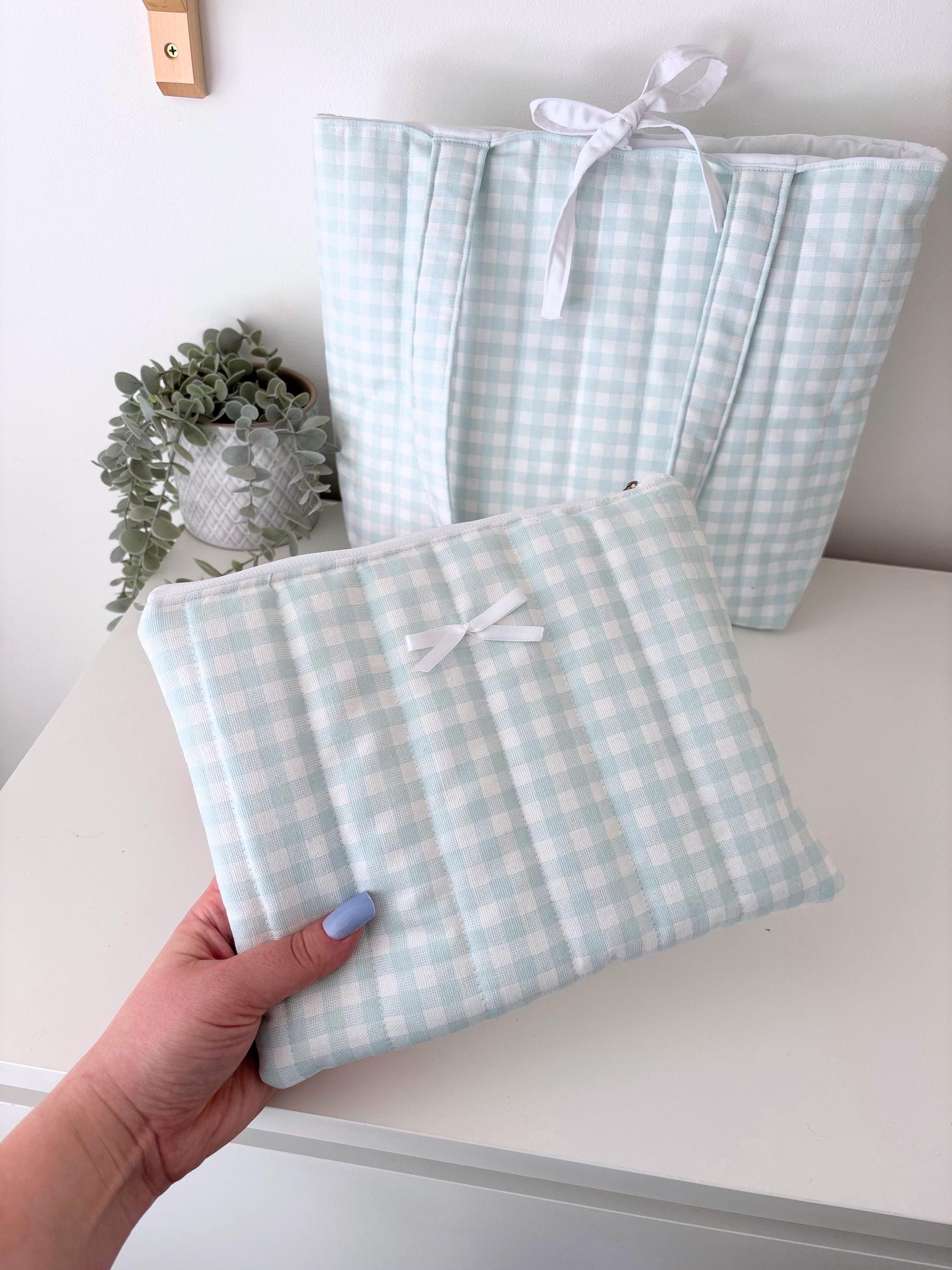 Pastel blue gingham quilted storage pouch