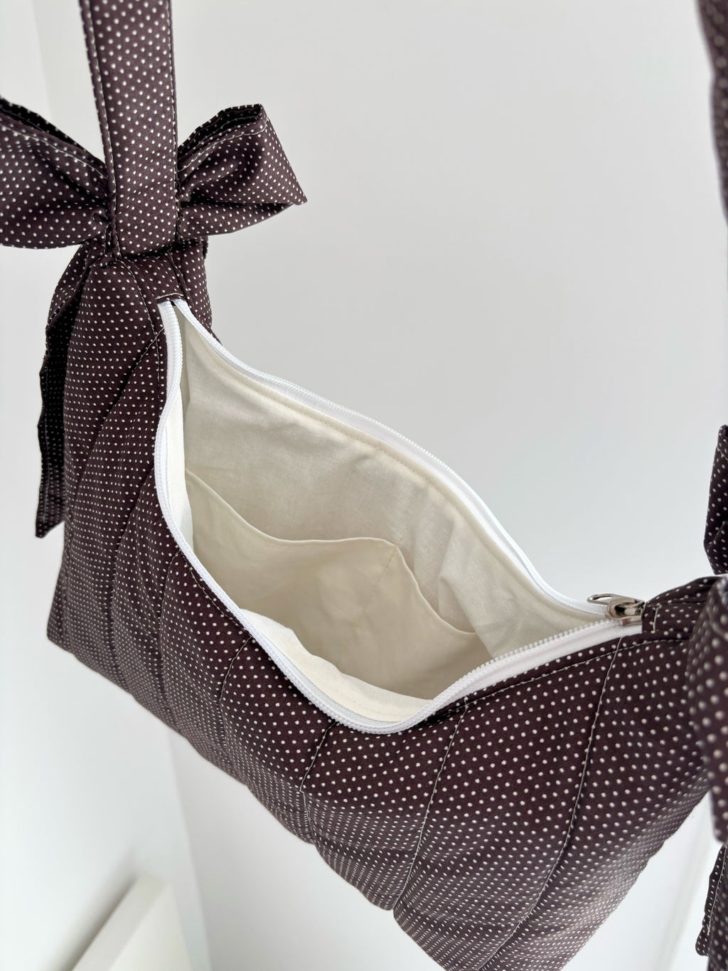 Brown mini polka dot bow shoulder bag