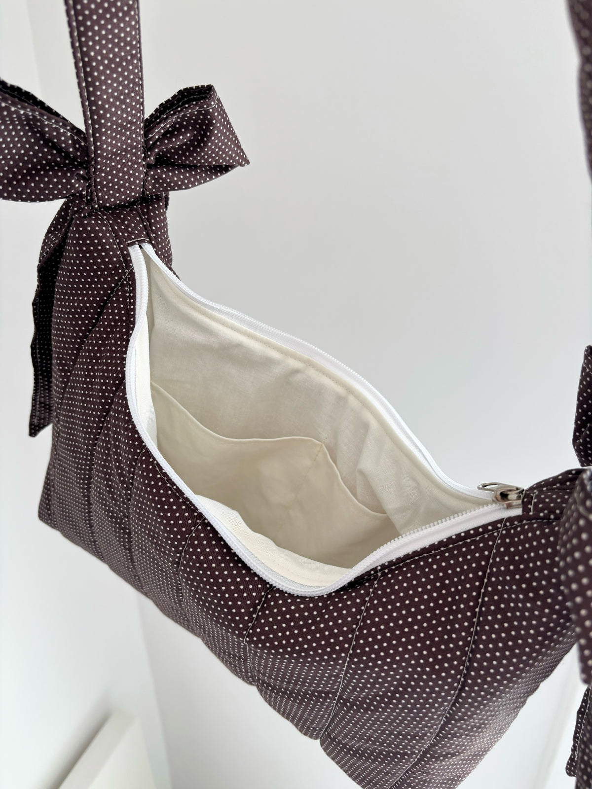 Brown mini polka dot bow shoulder bag