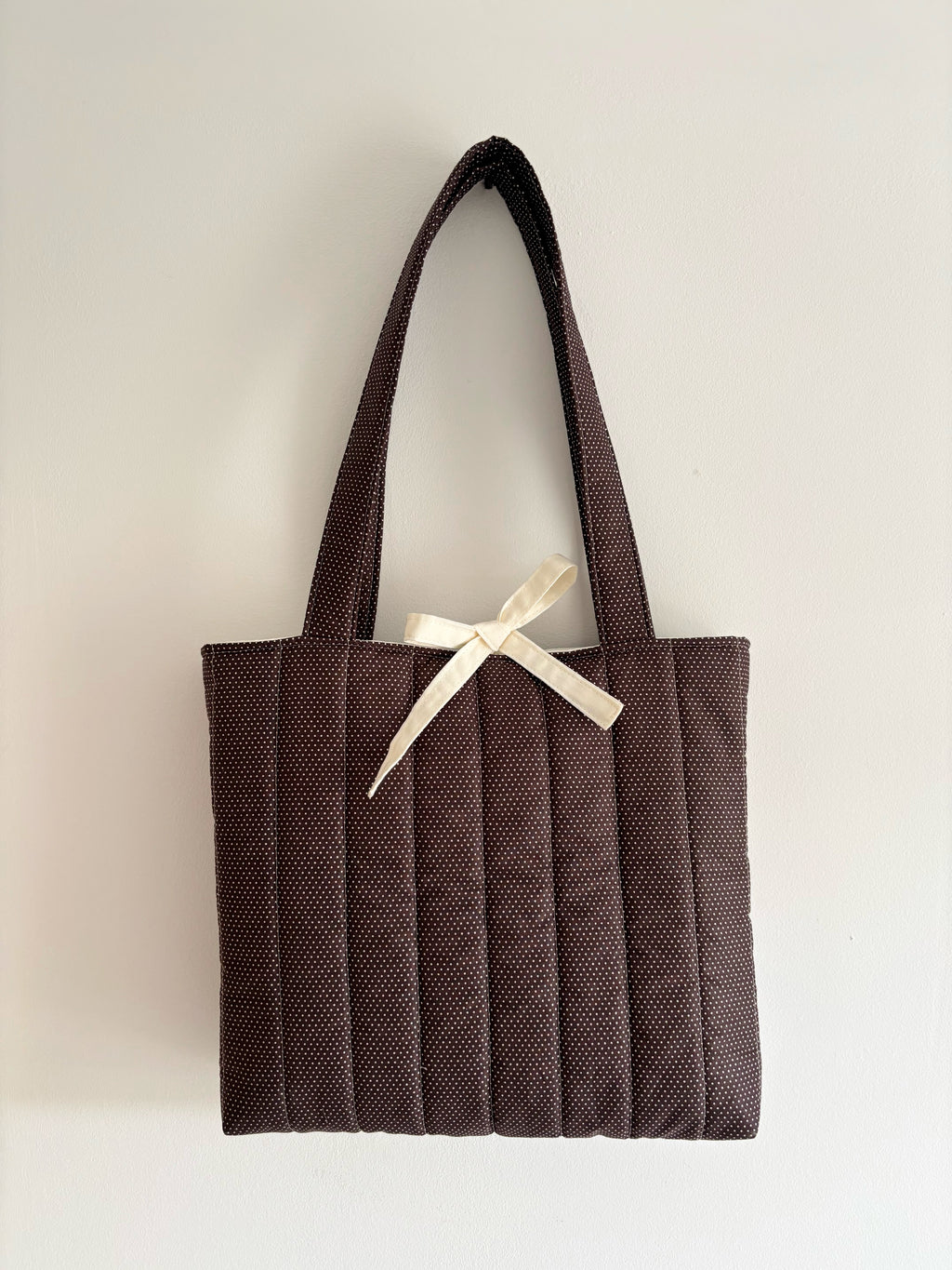 Brown mini polka dot quilted tote bag
