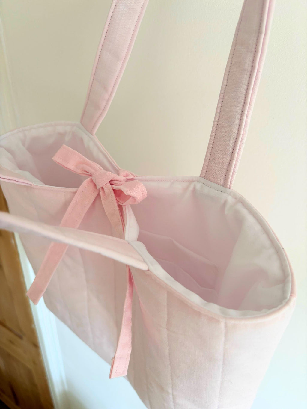 Pastel pink quilted tote bag