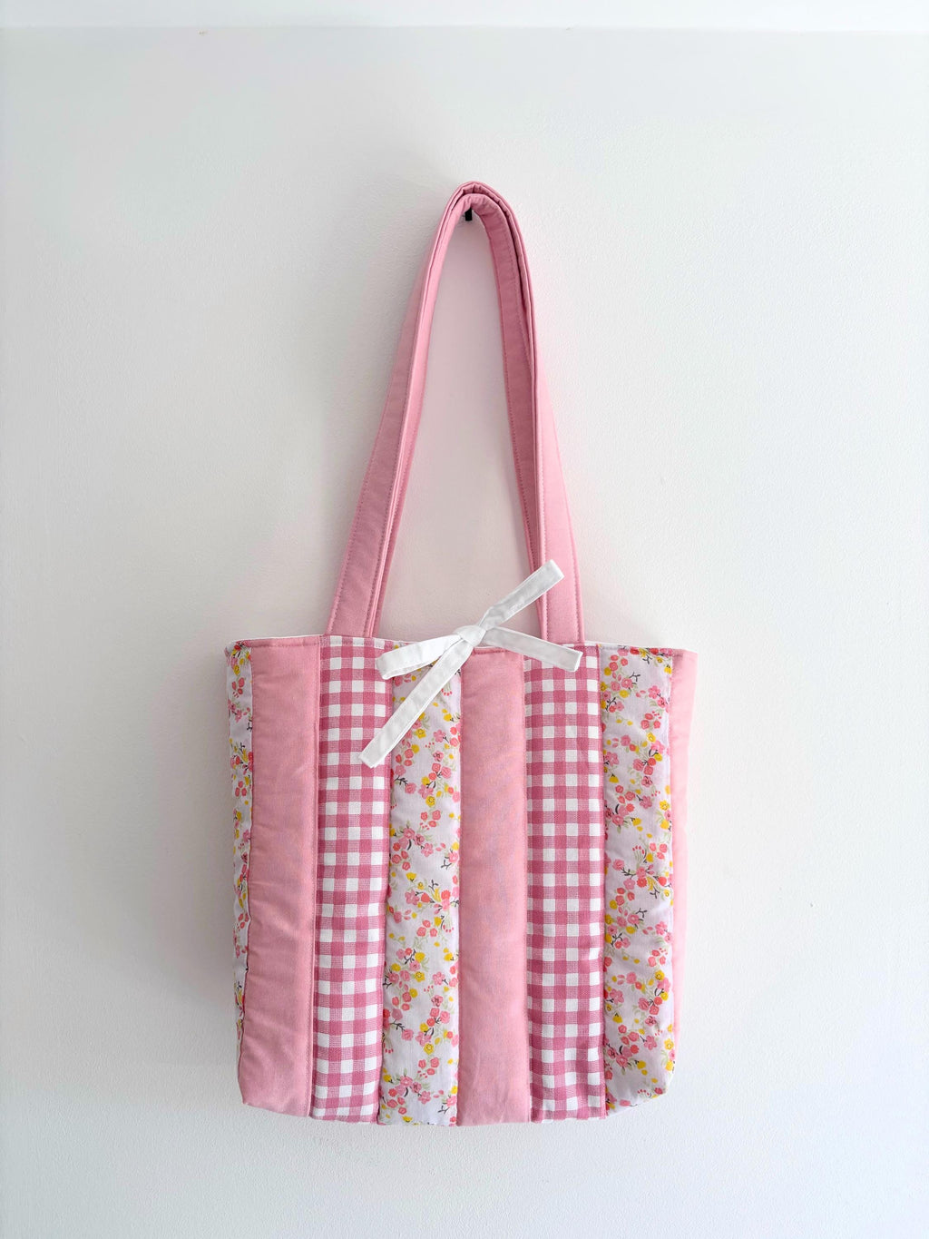 Pink patchwork quilted tote bag