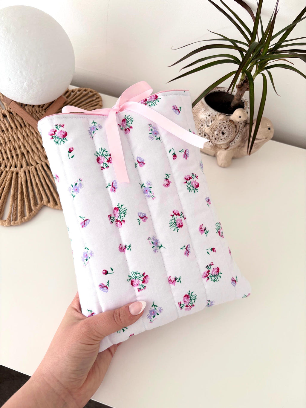 Pink floral quilted book sleeve