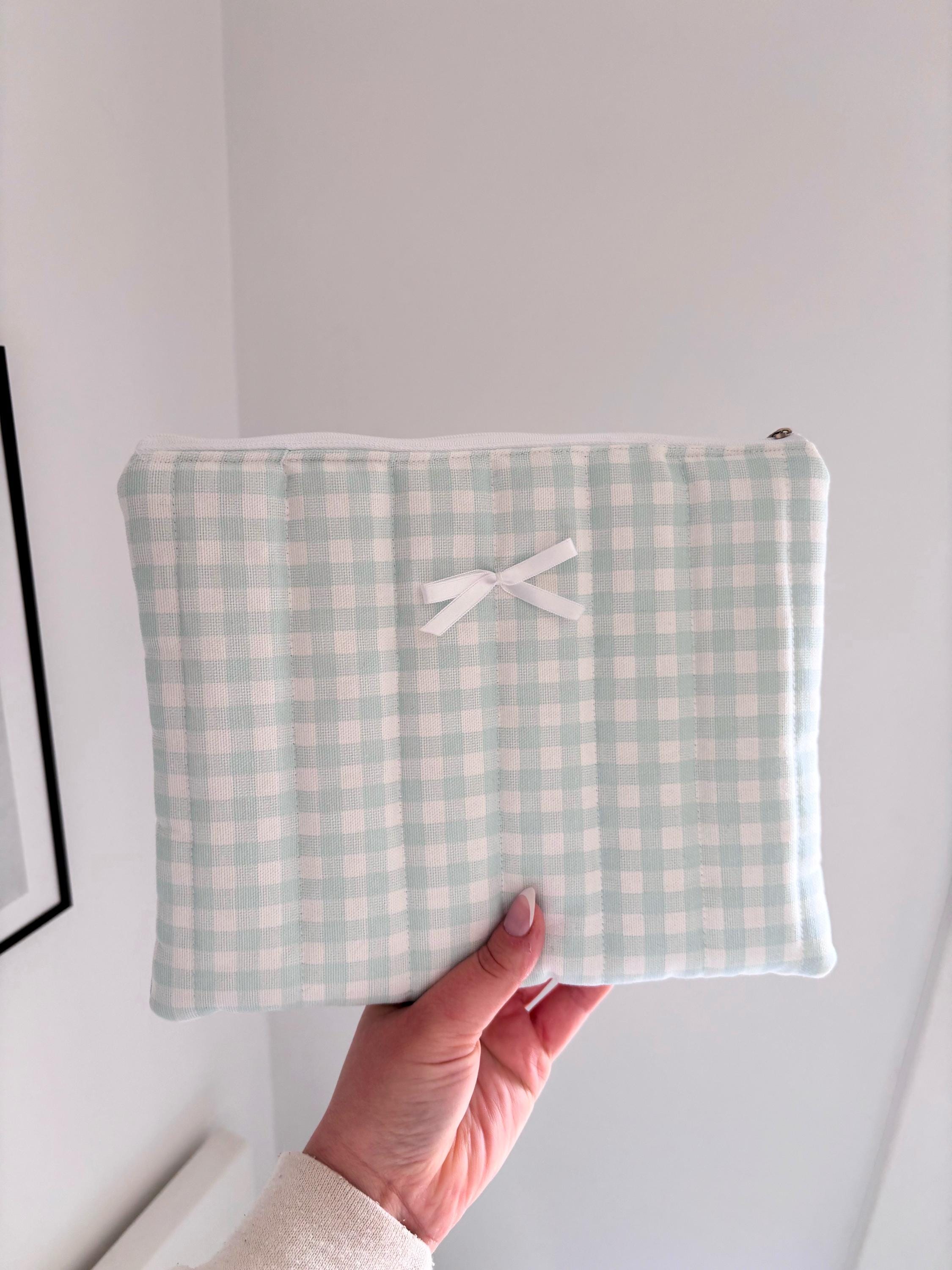 Pastel blue gingham quilted storage pouch