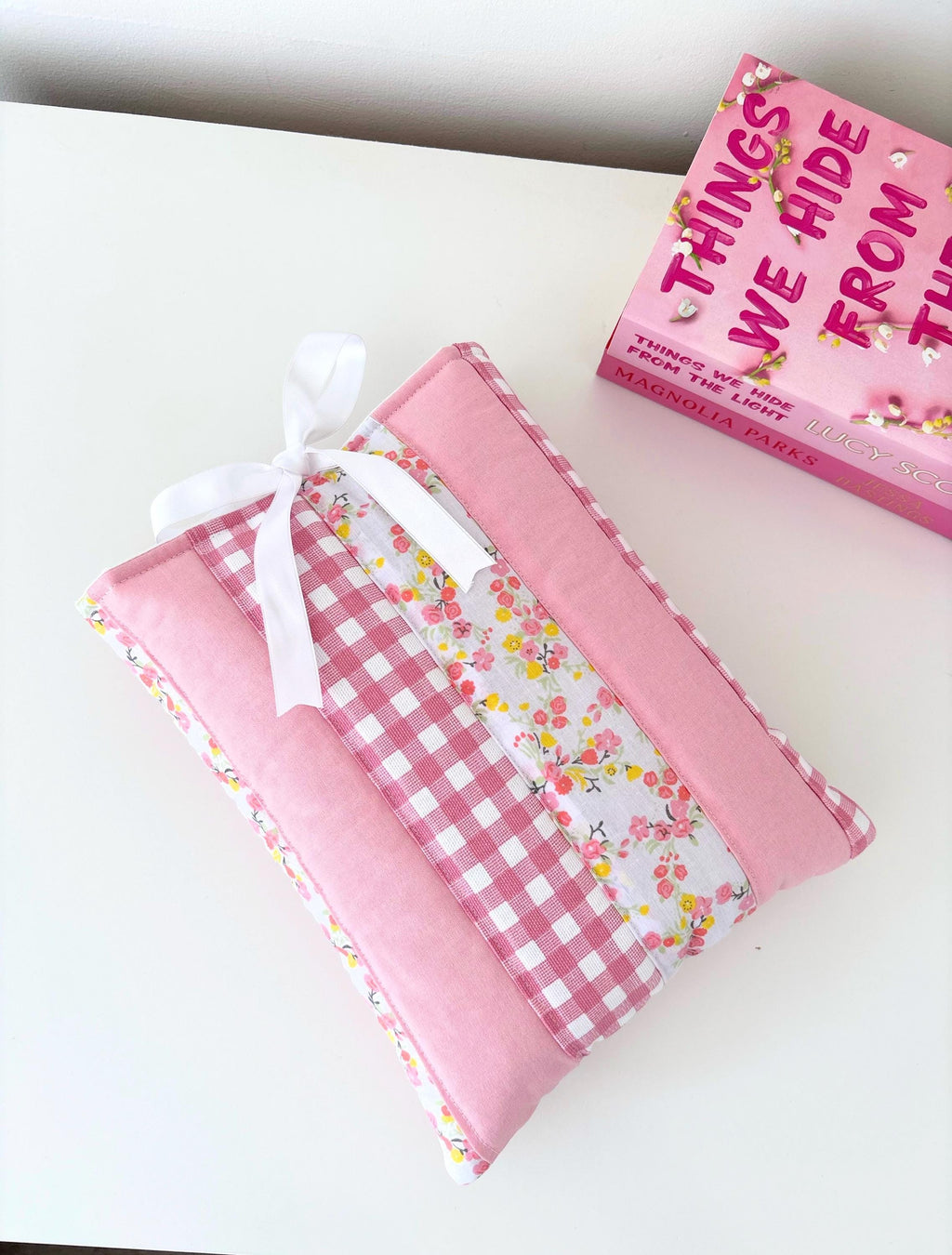 Pink patchwork quilted book sleeve
