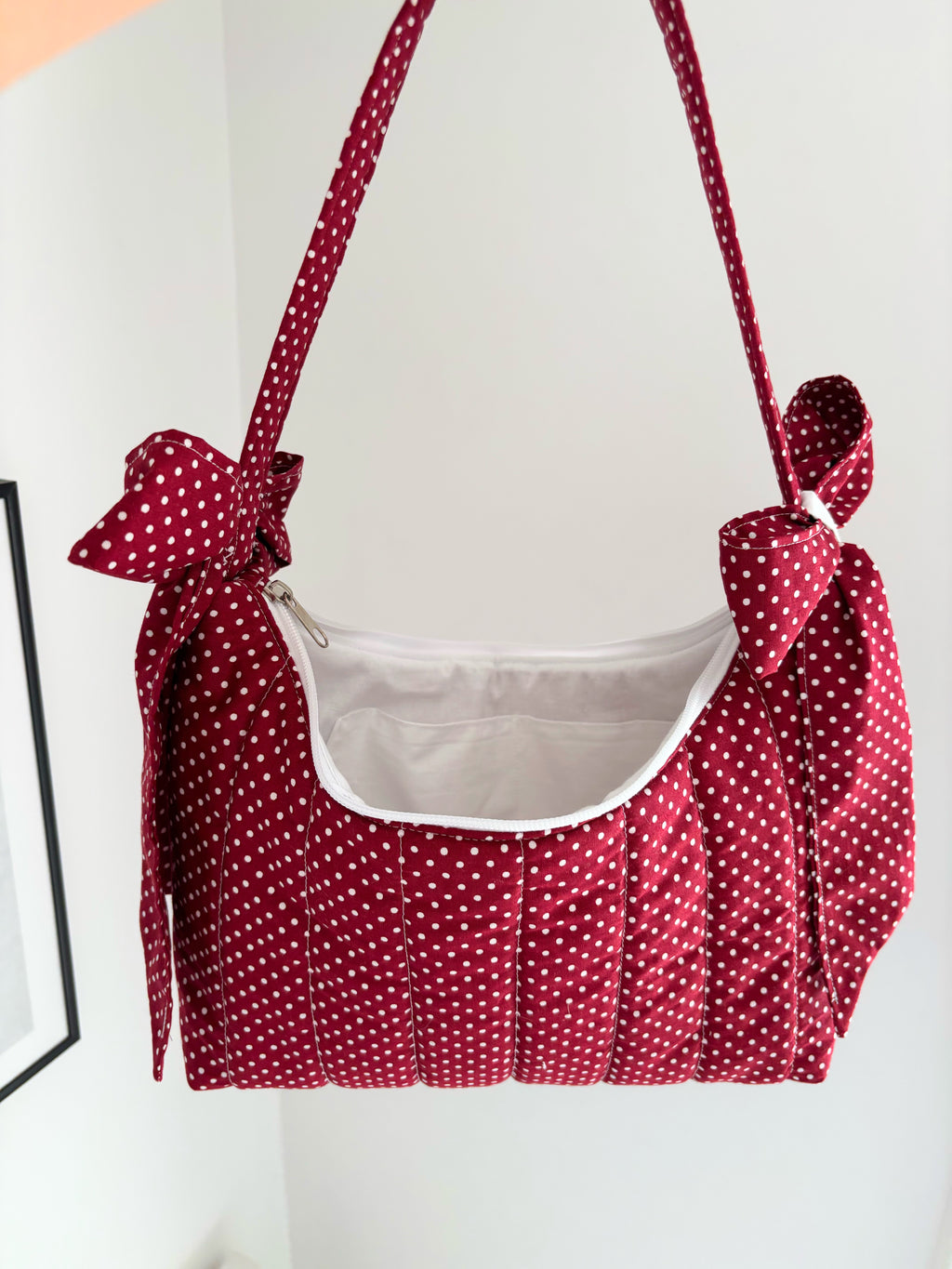 Red polka dot bow shoulder bag
