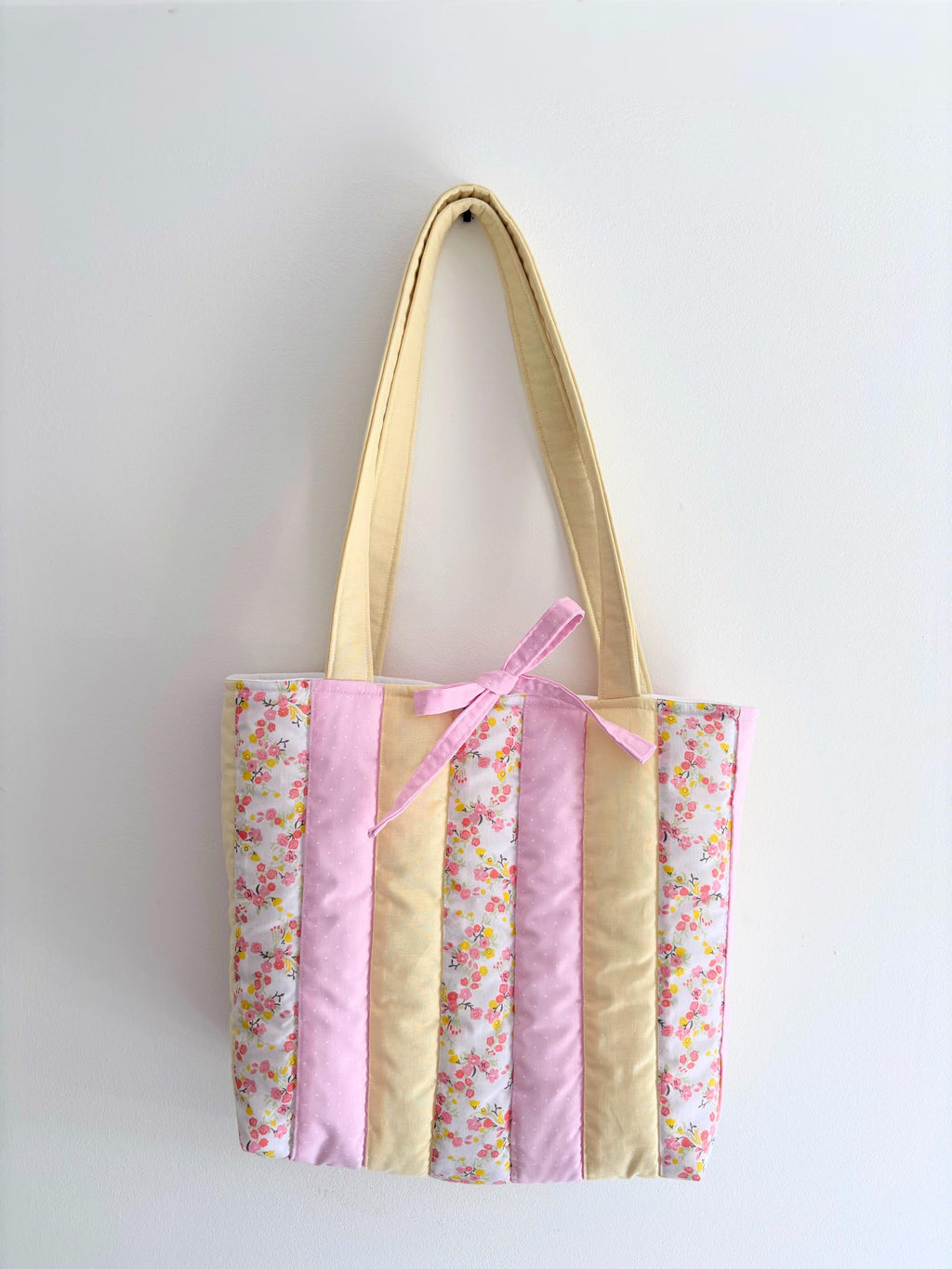Pastel yellow and pink patchwork quilted tote bag