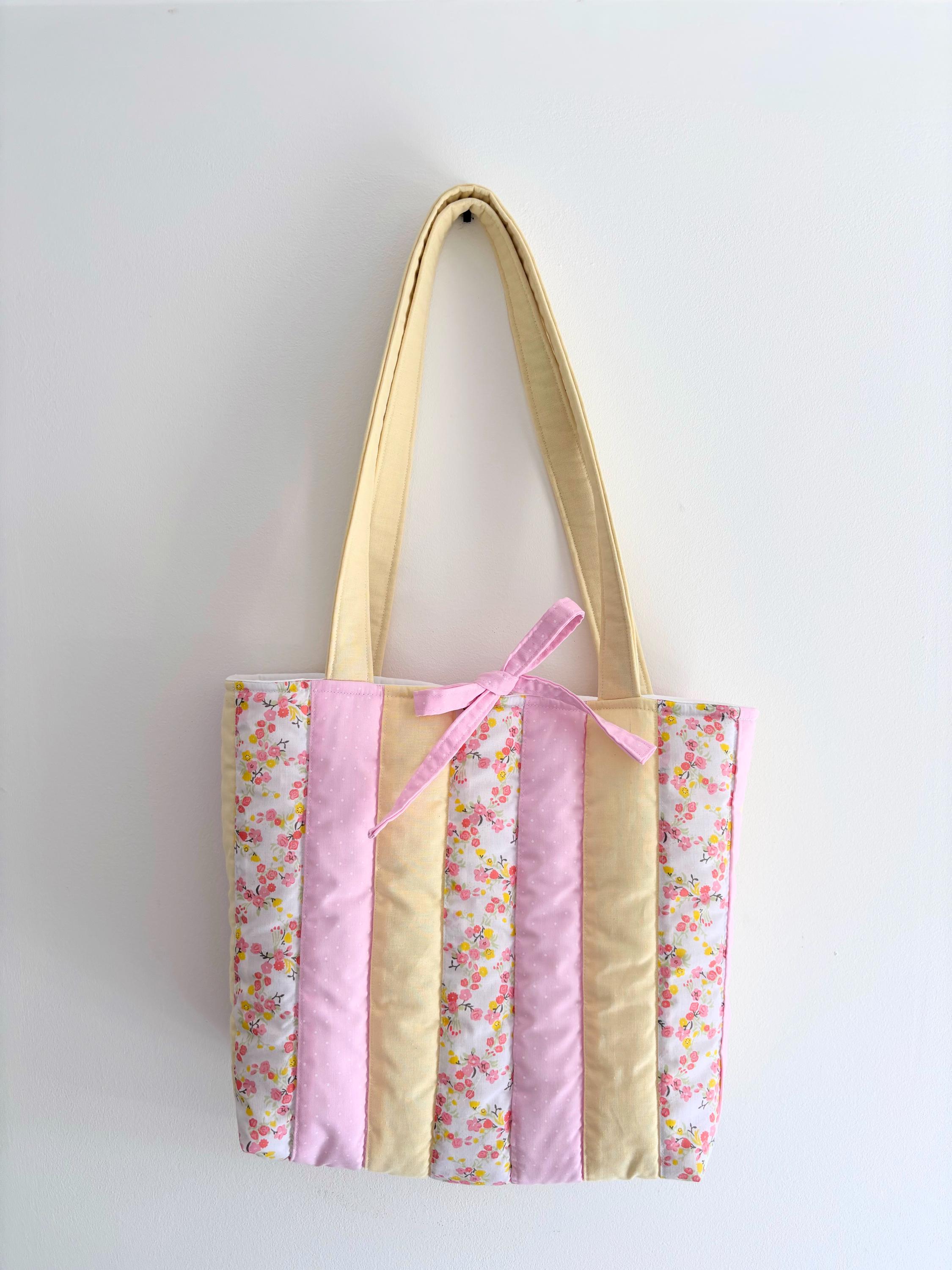Pastel yellow and pink patchwork quilted tote bag
