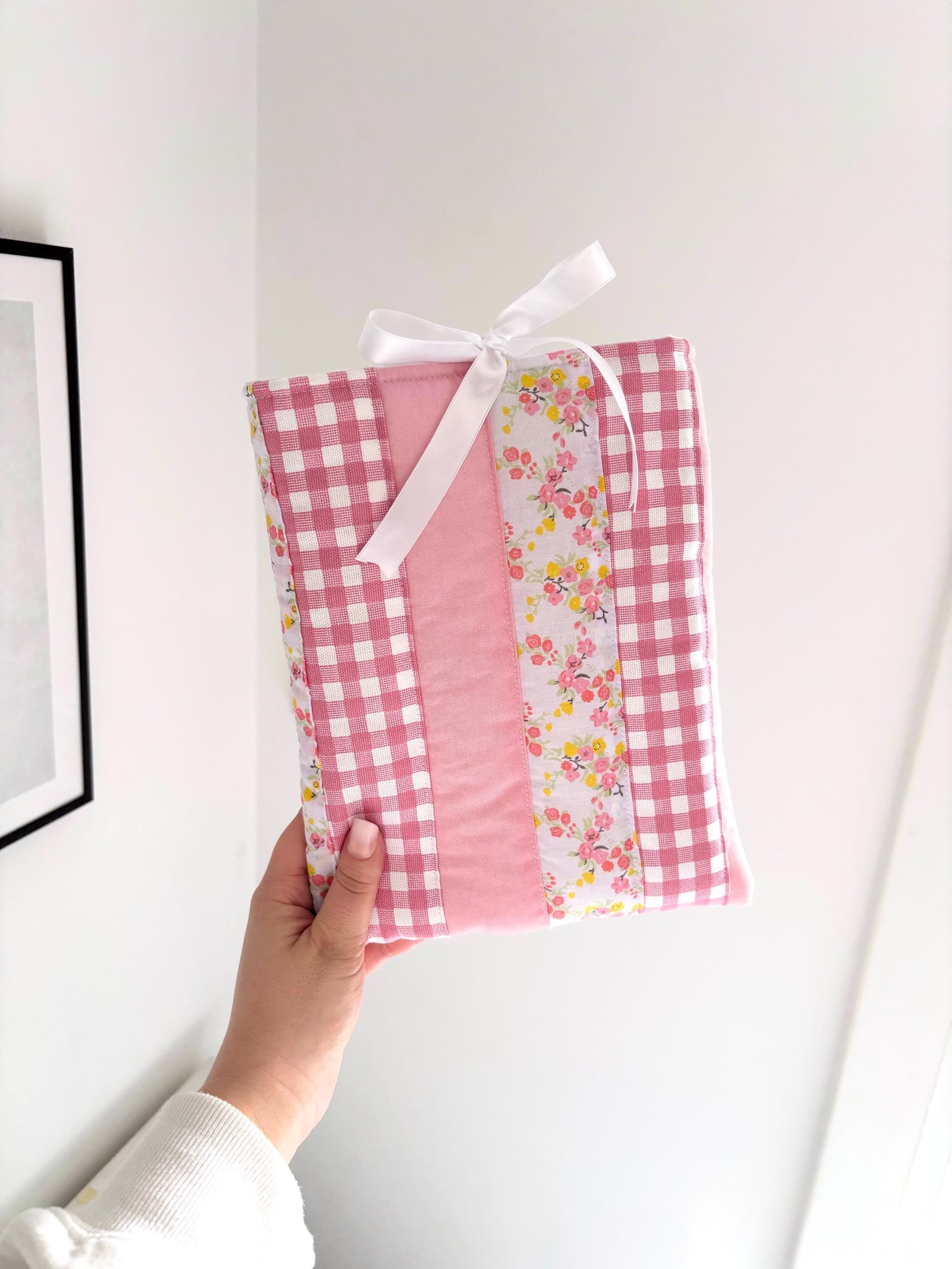 Pink patchwork quilted book sleeve