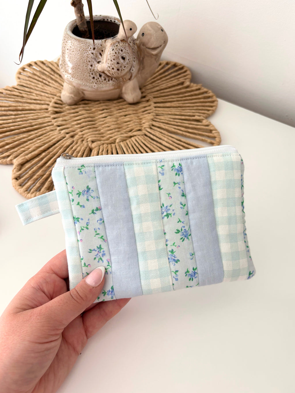 Small quilted blue patchwork pouch