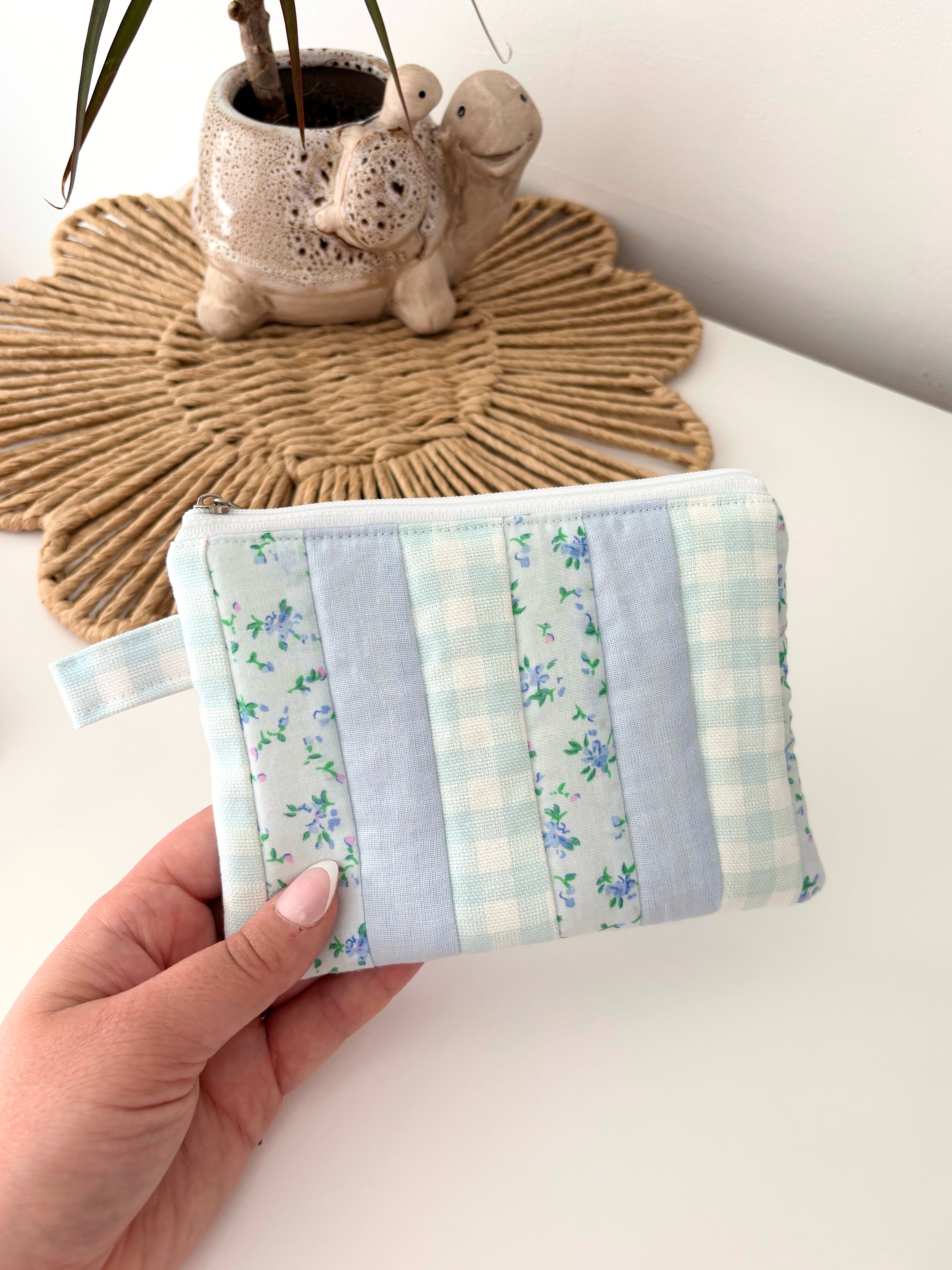 Small quilted blue patchwork pouch