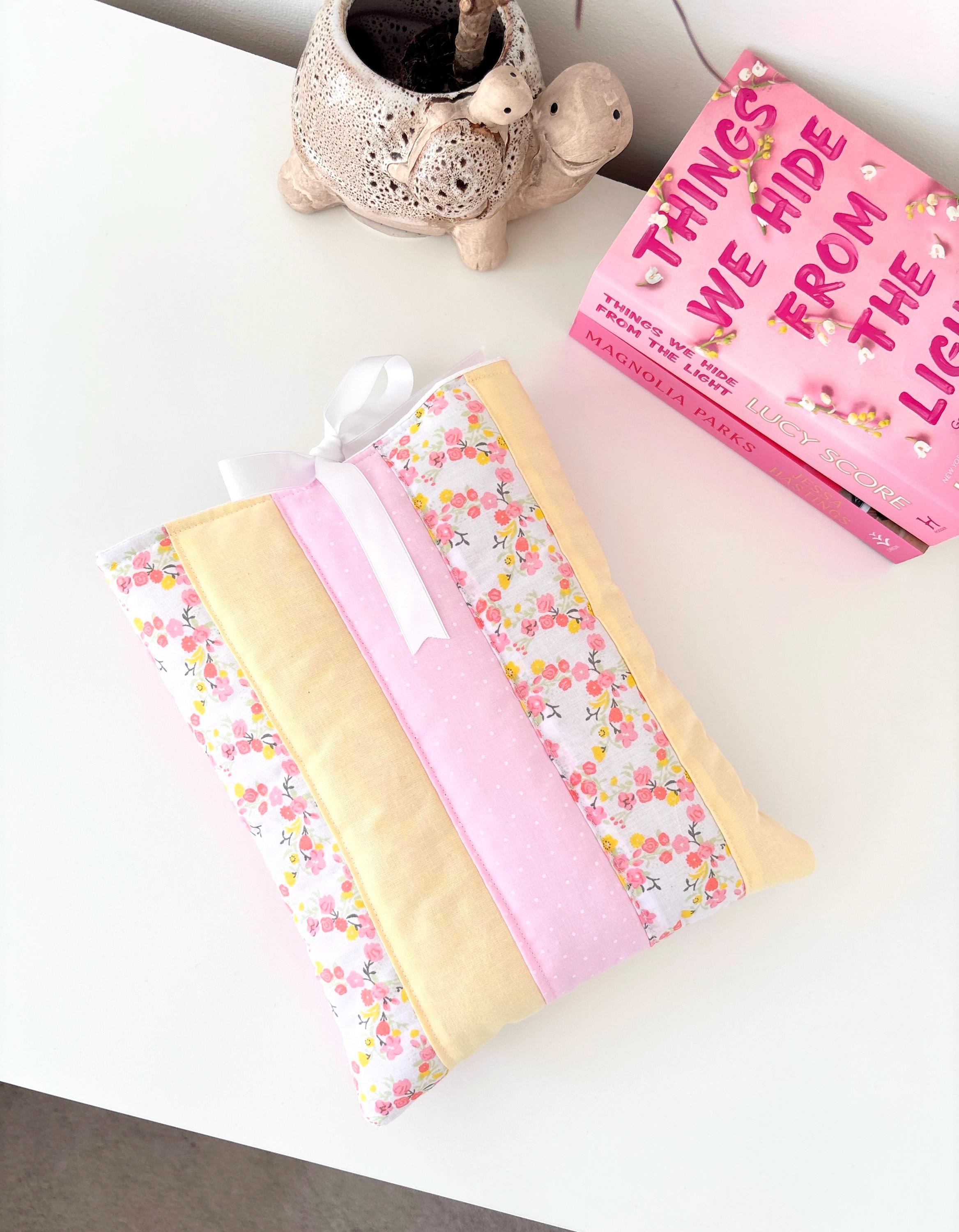 Pastel pink and yellow patchwork quilted book sleeve