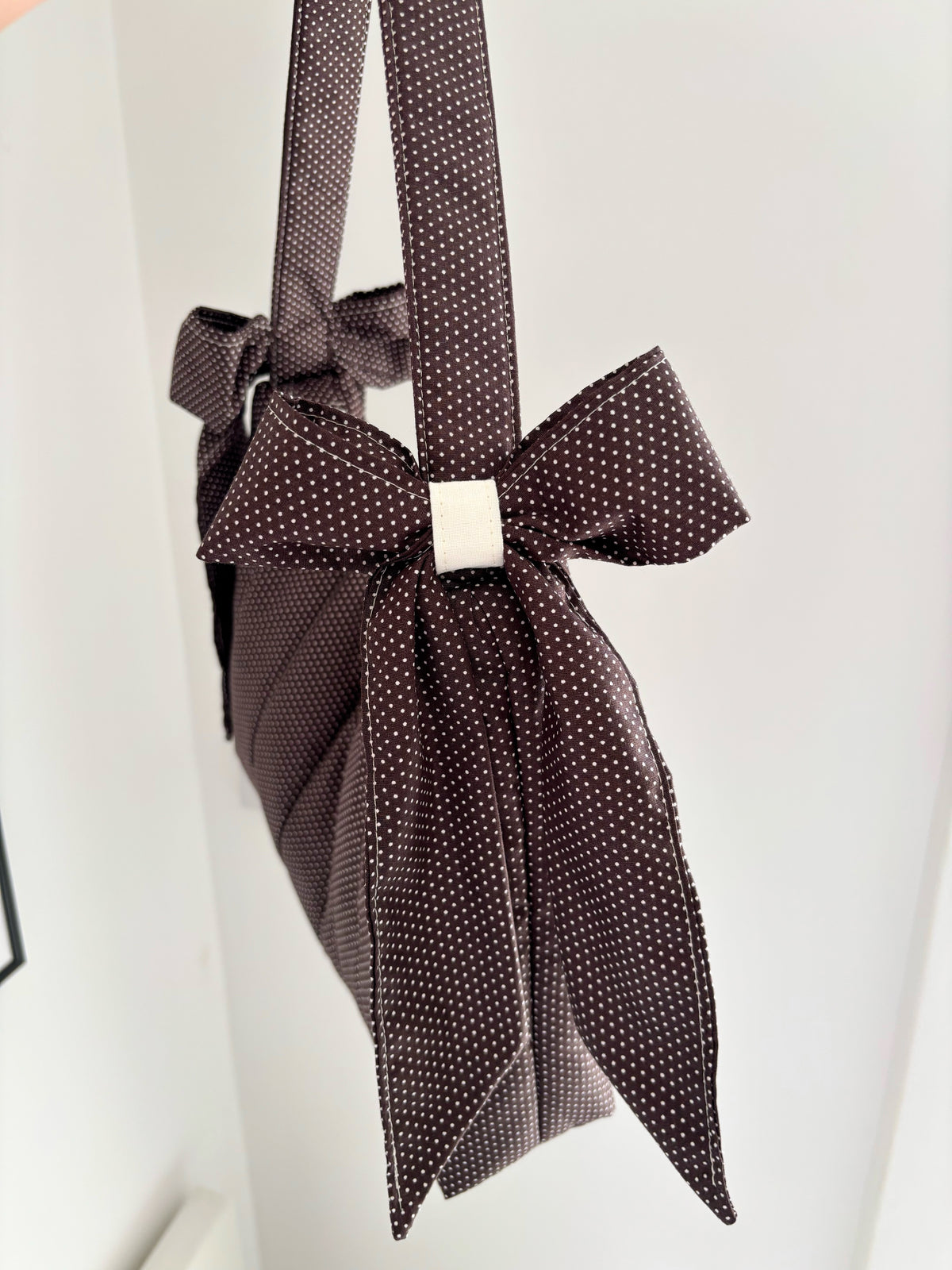 Brown mini polka dot bow shoulder bag
