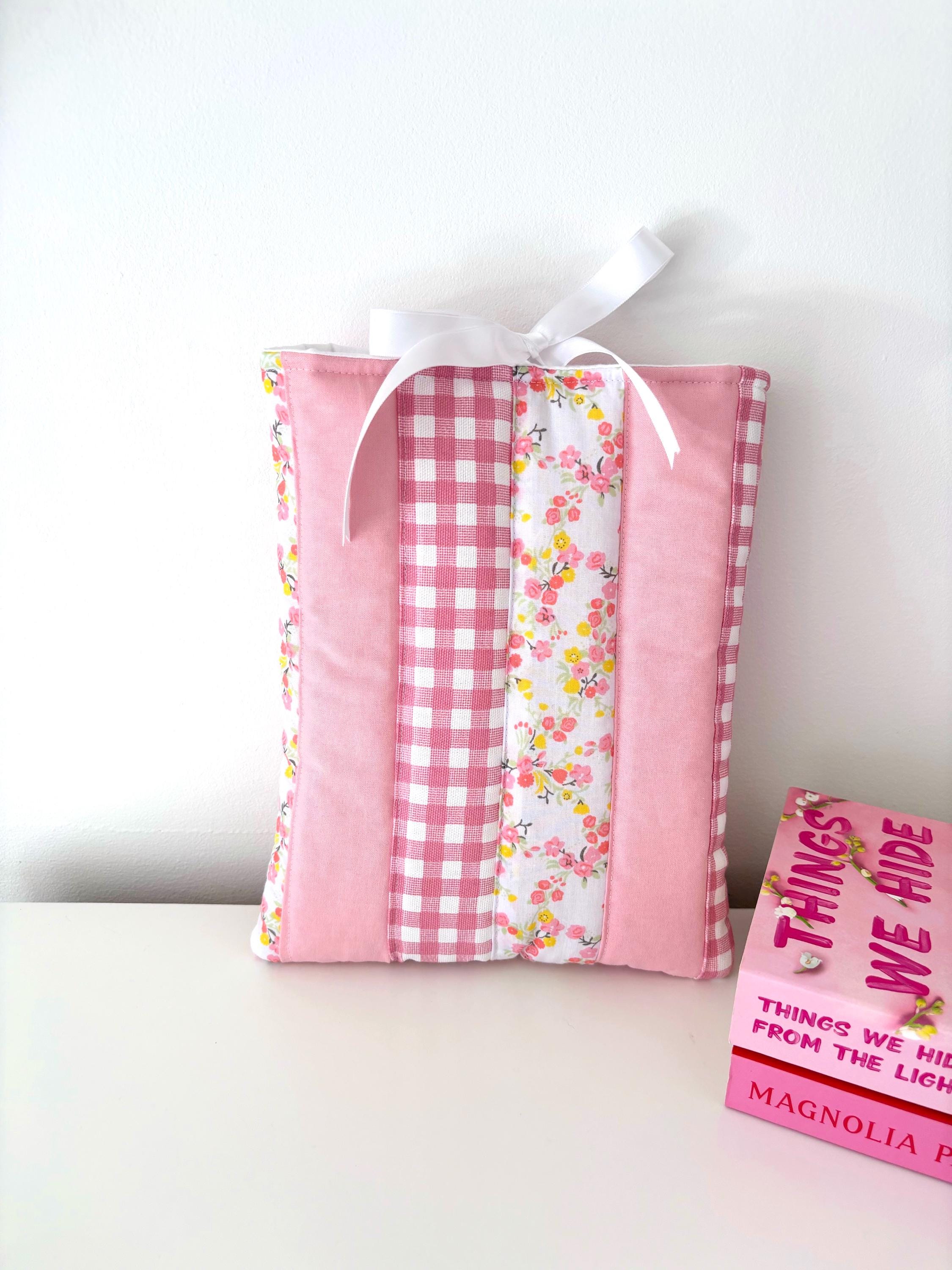 Pink patchwork quilted book sleeve