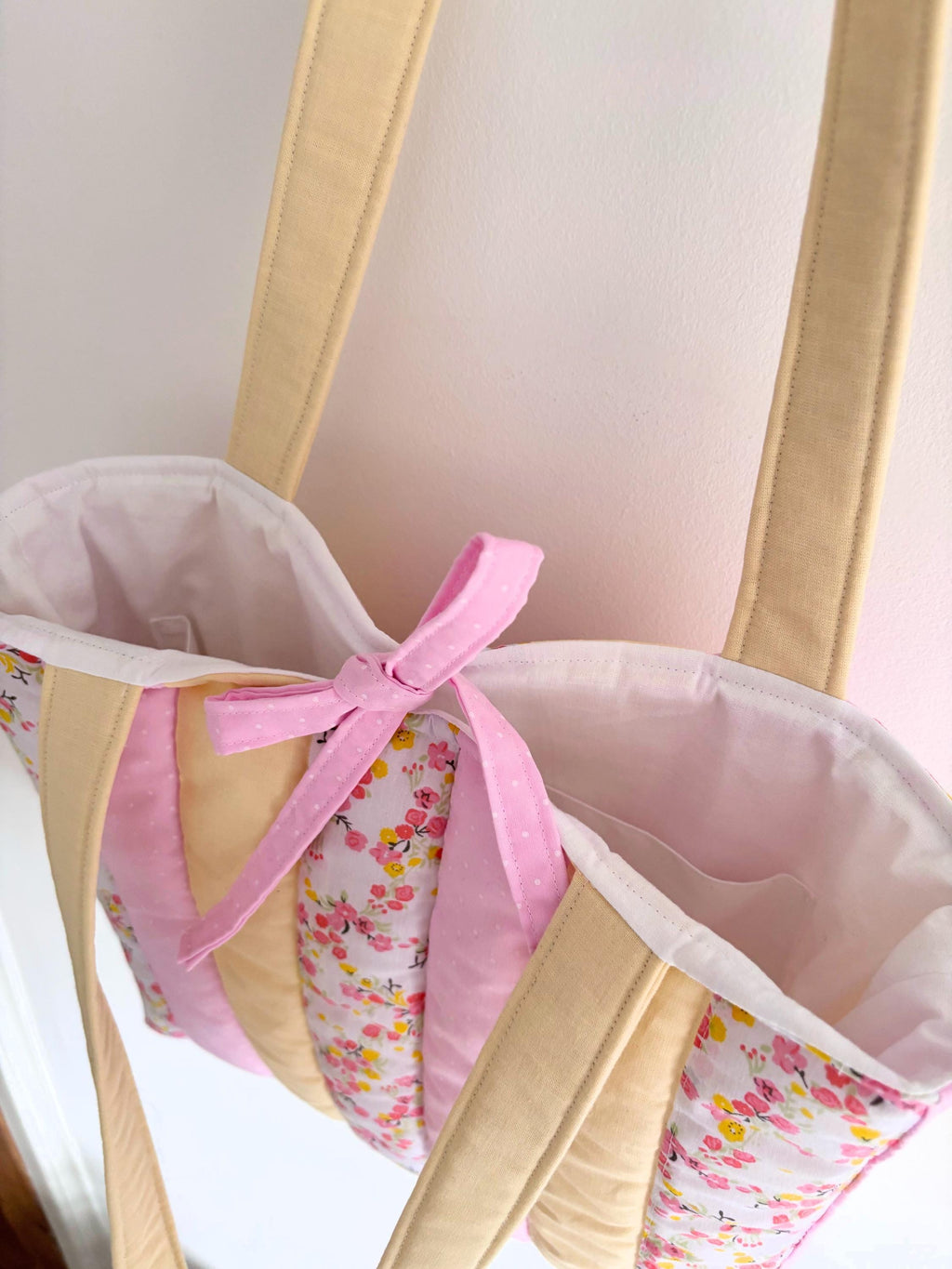 Pastel yellow and pink patchwork quilted tote bag