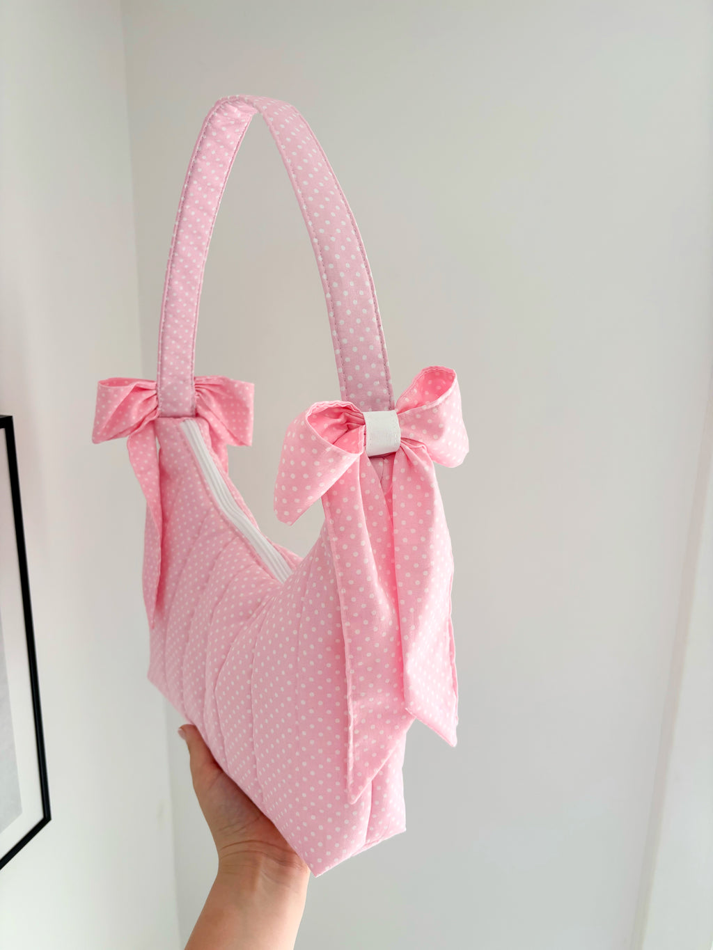 Pink polka dot quilted bow shoulder bag
