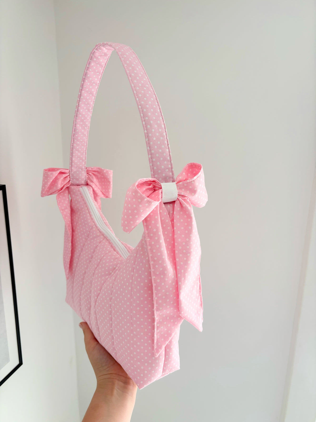 Pink polka dot quilted bow shoulder bag