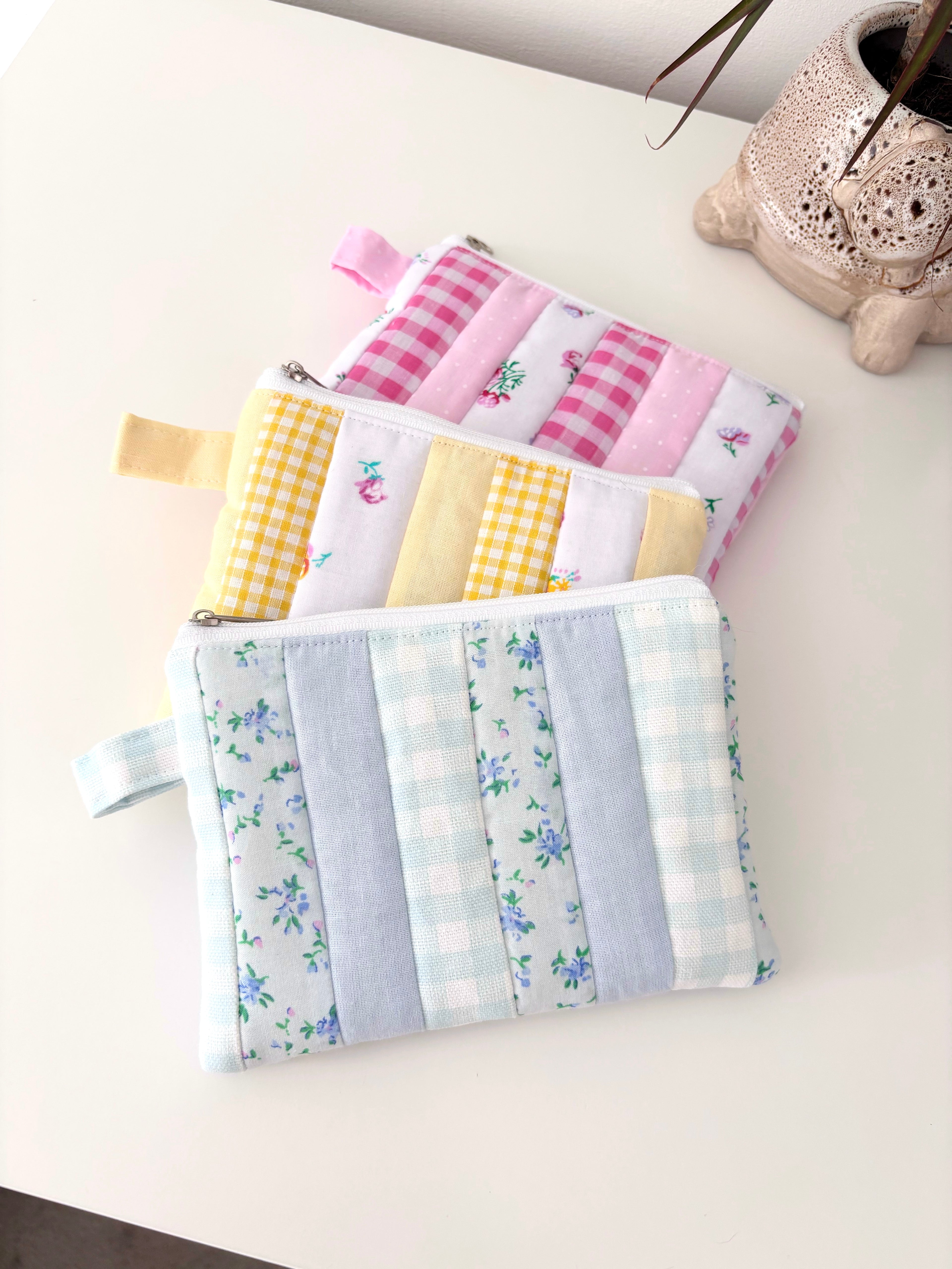 Small quilted blue patchwork pouch