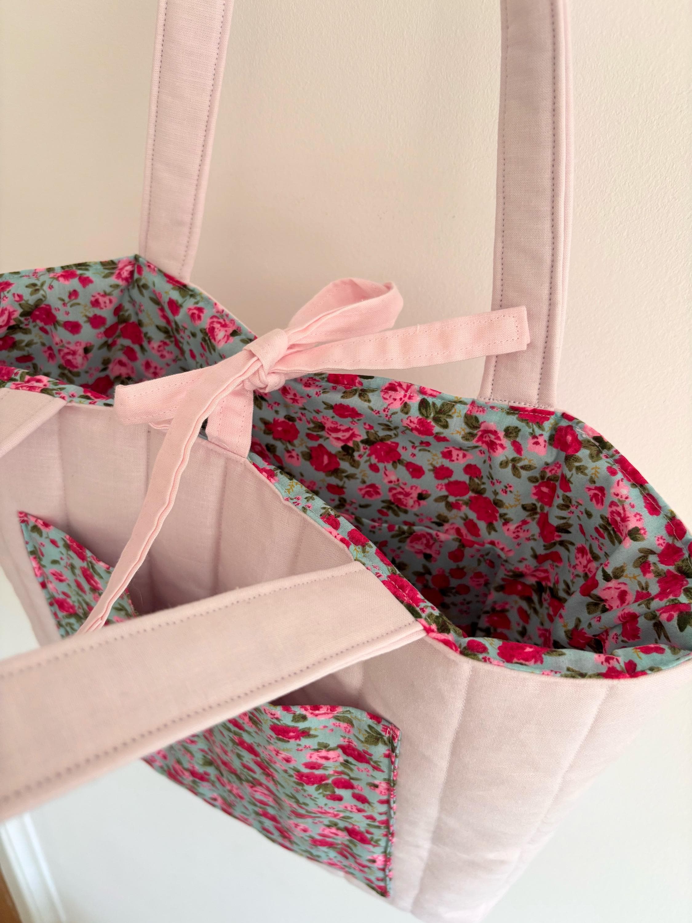 Pink floral quilted tote bag
