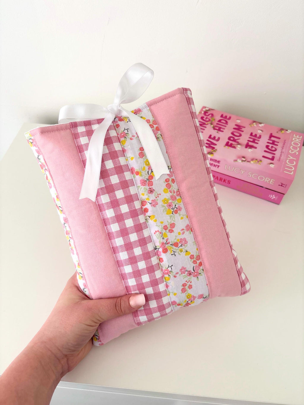 Pink patchwork quilted book sleeve