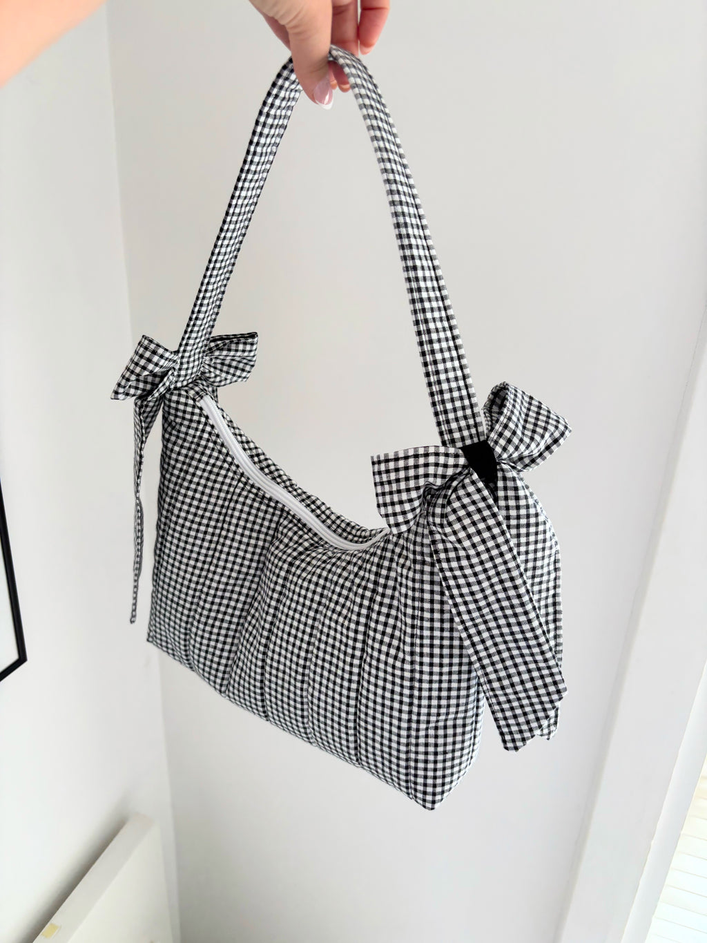 Black and white gingham quilted bow shoulder bag