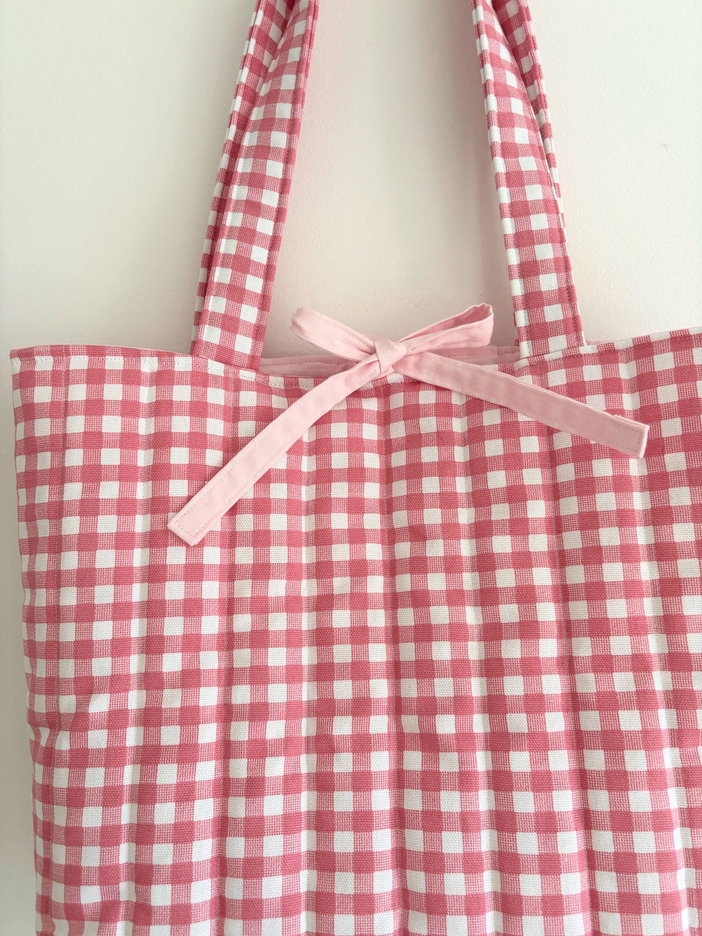 Pink gingham quilted tote bag