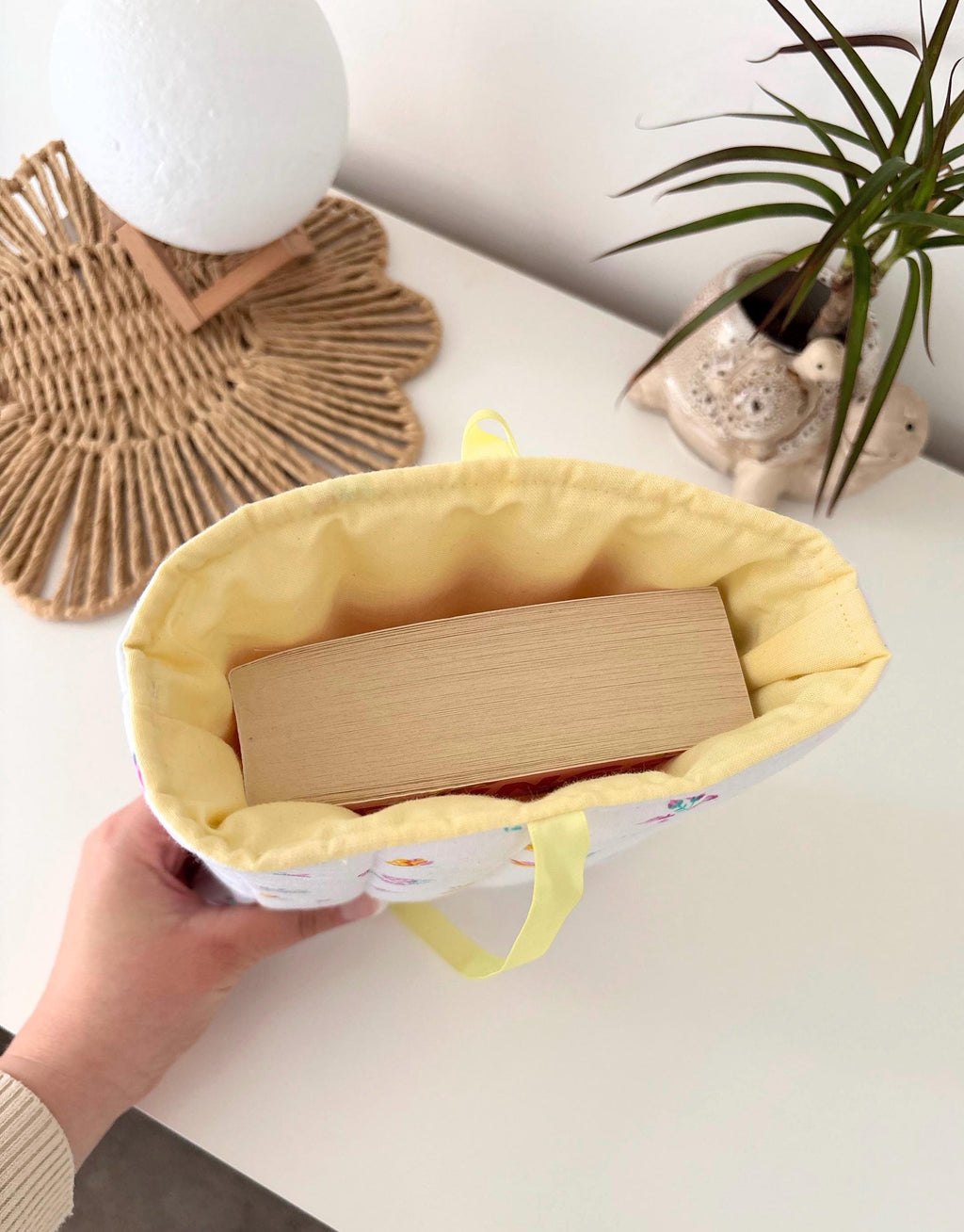 Yellow floral quilted book sleeve