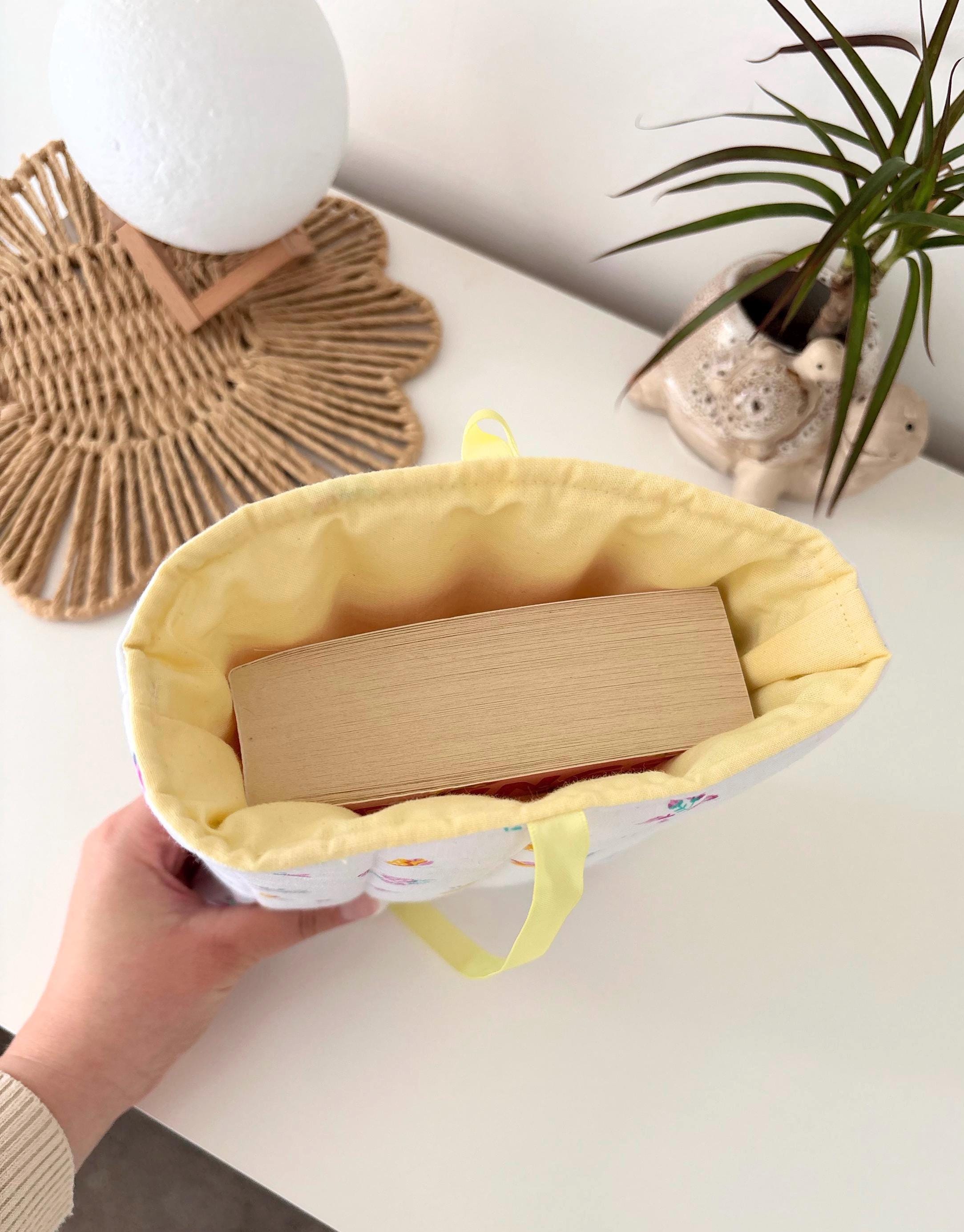 Yellow floral quilted book sleeve