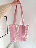 Pink patchwork quilted tote bag