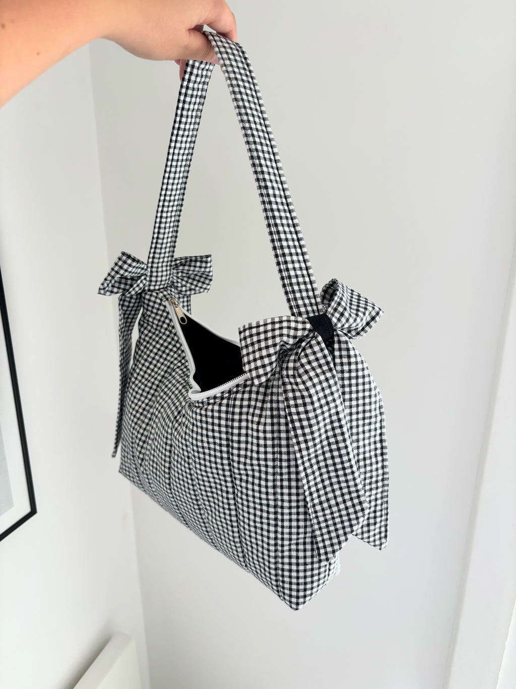 Black and white gingham quilted bow shoulder bag