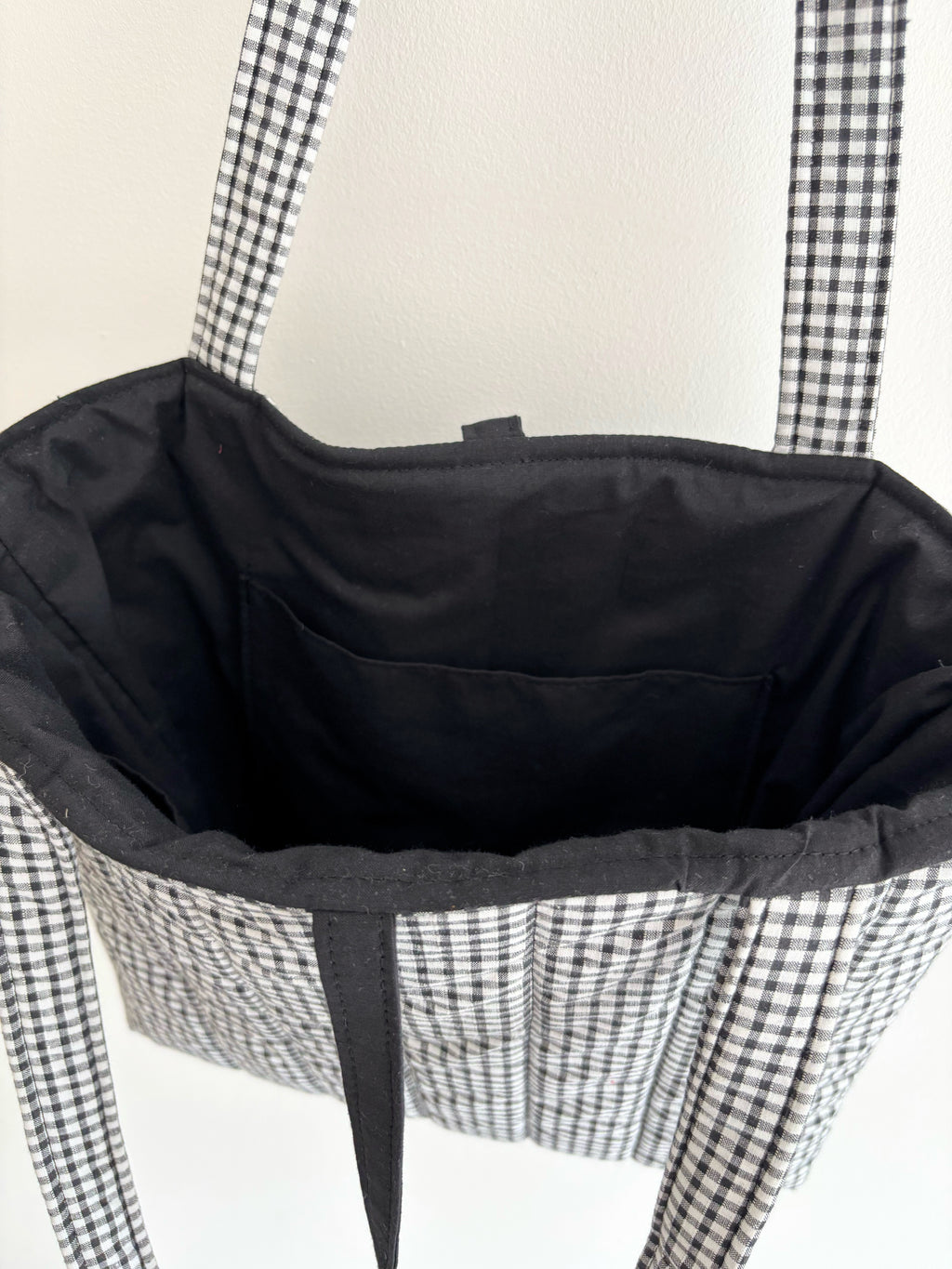 Black and white gingham quilted tote bag