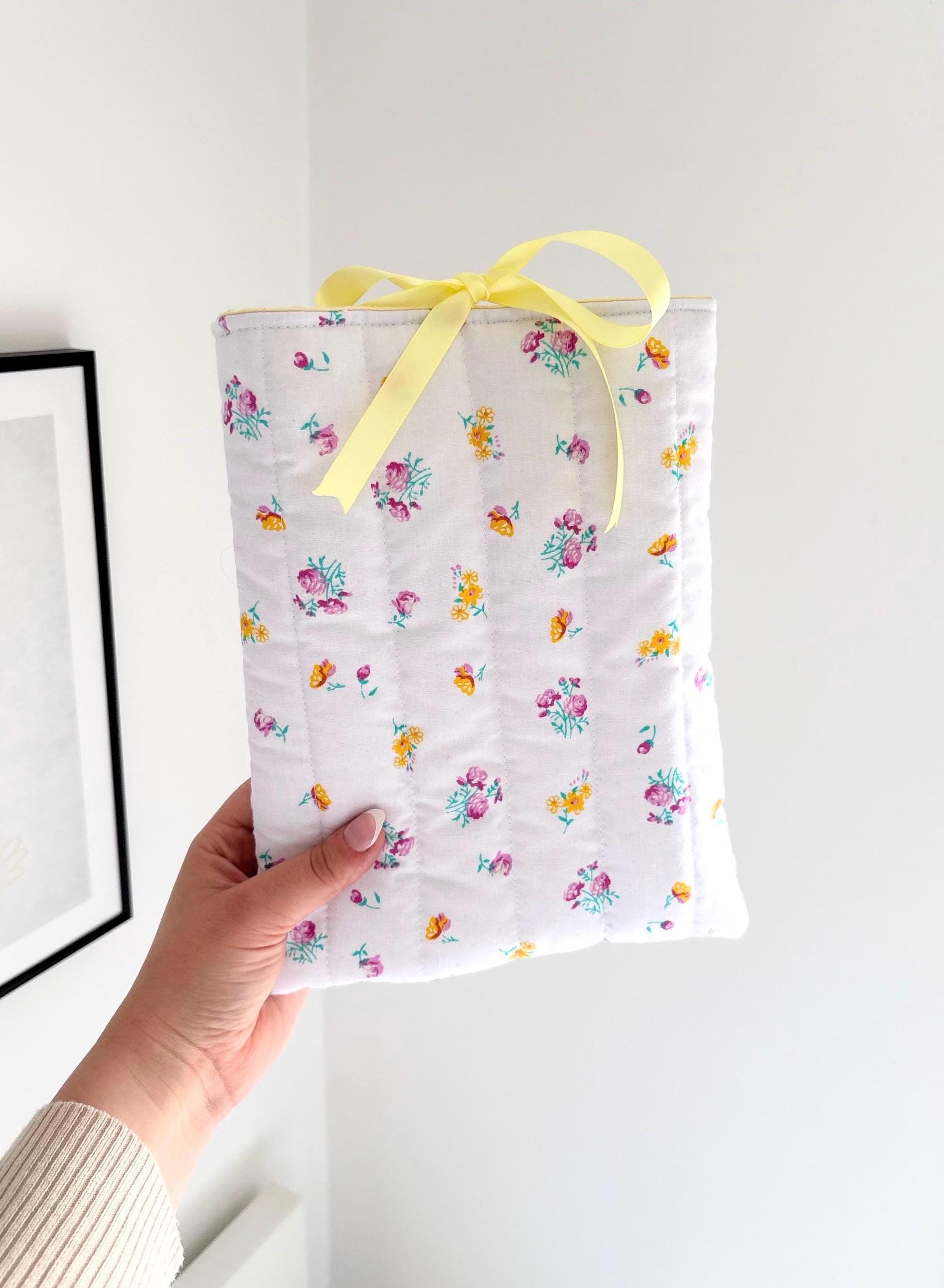 Yellow floral quilted book sleeve