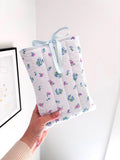 Blue floral quilted book sleeve
