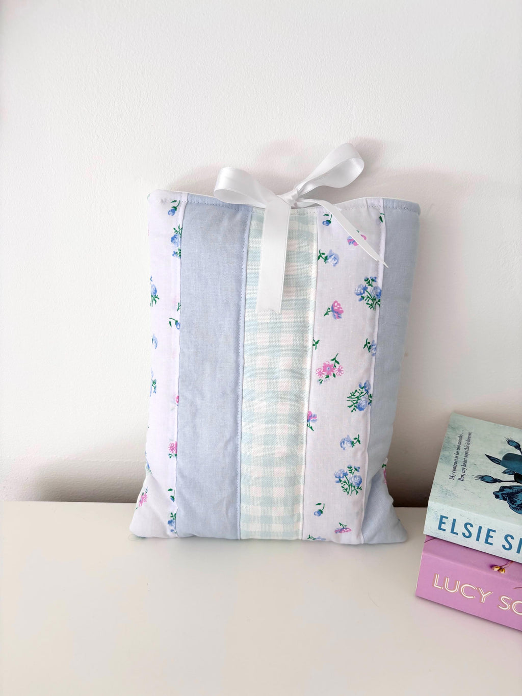 Pastel blue patchwork quilted book sleeve