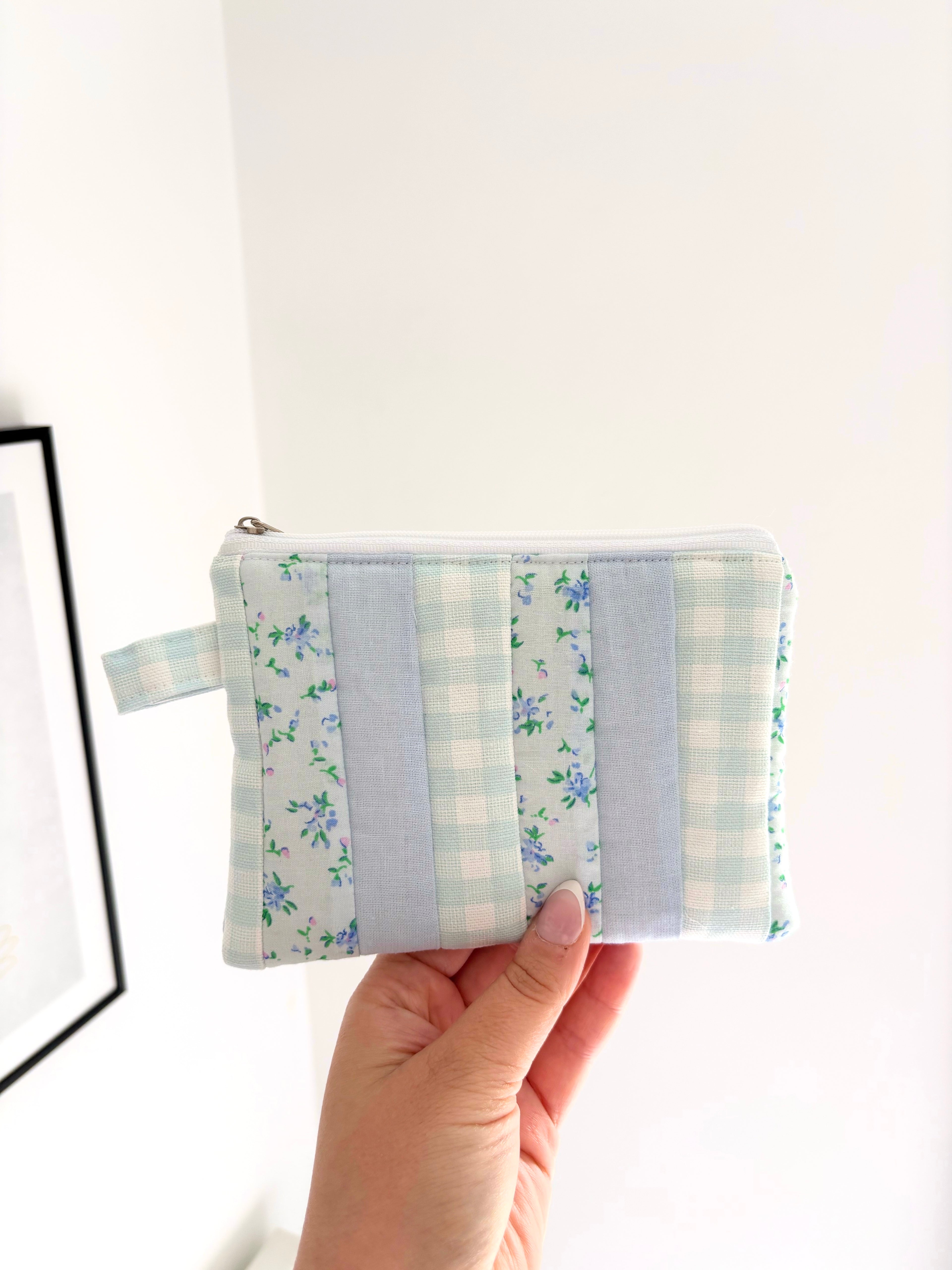 Small quilted blue patchwork pouch