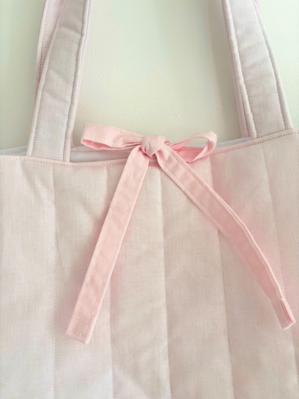 Pastel pink quilted tote bag