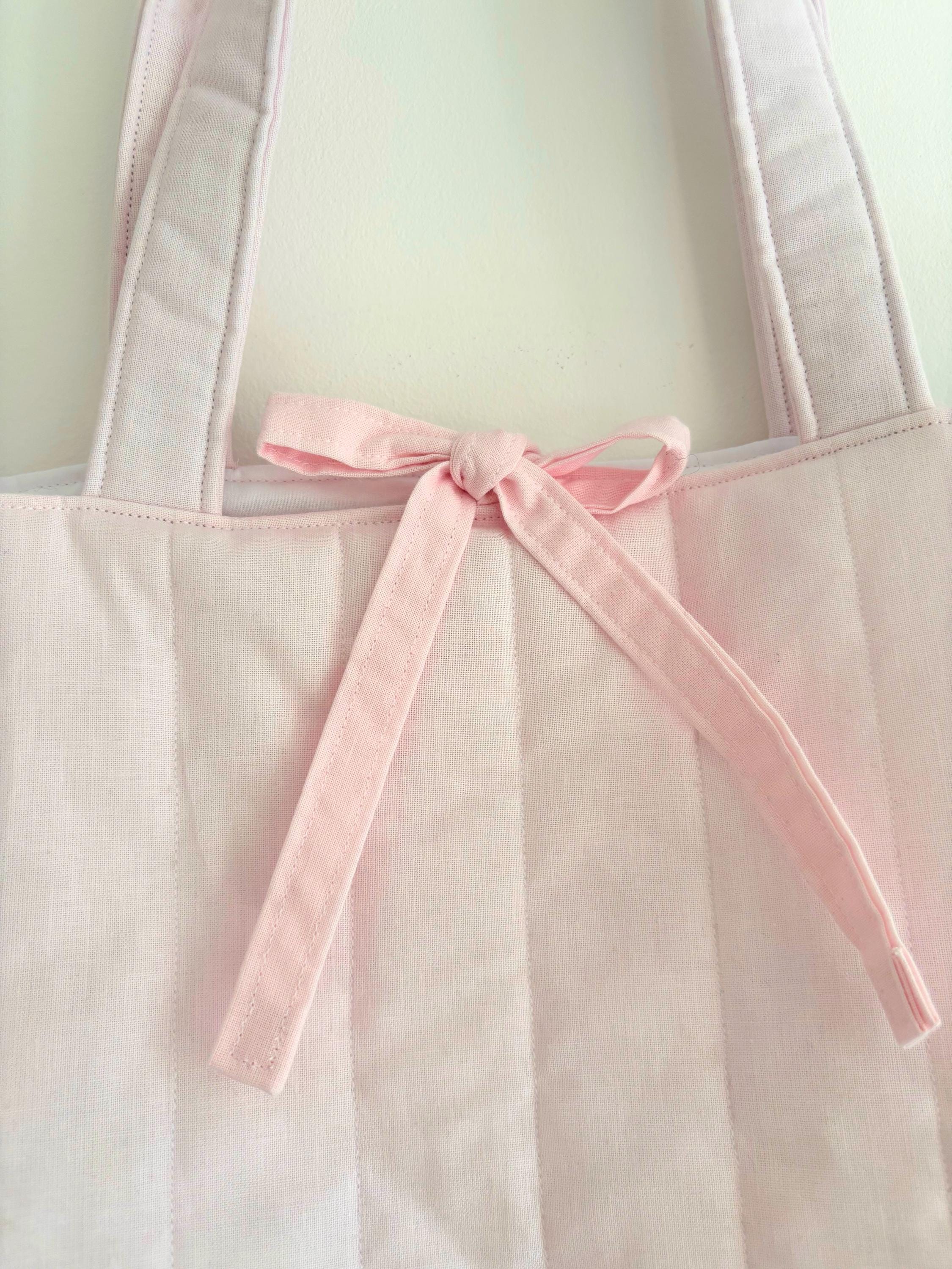 Pastel pink quilted tote bag