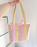Pastel yellow and pink patchwork quilted tote bag