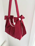 Red polka dot bow shoulder bag