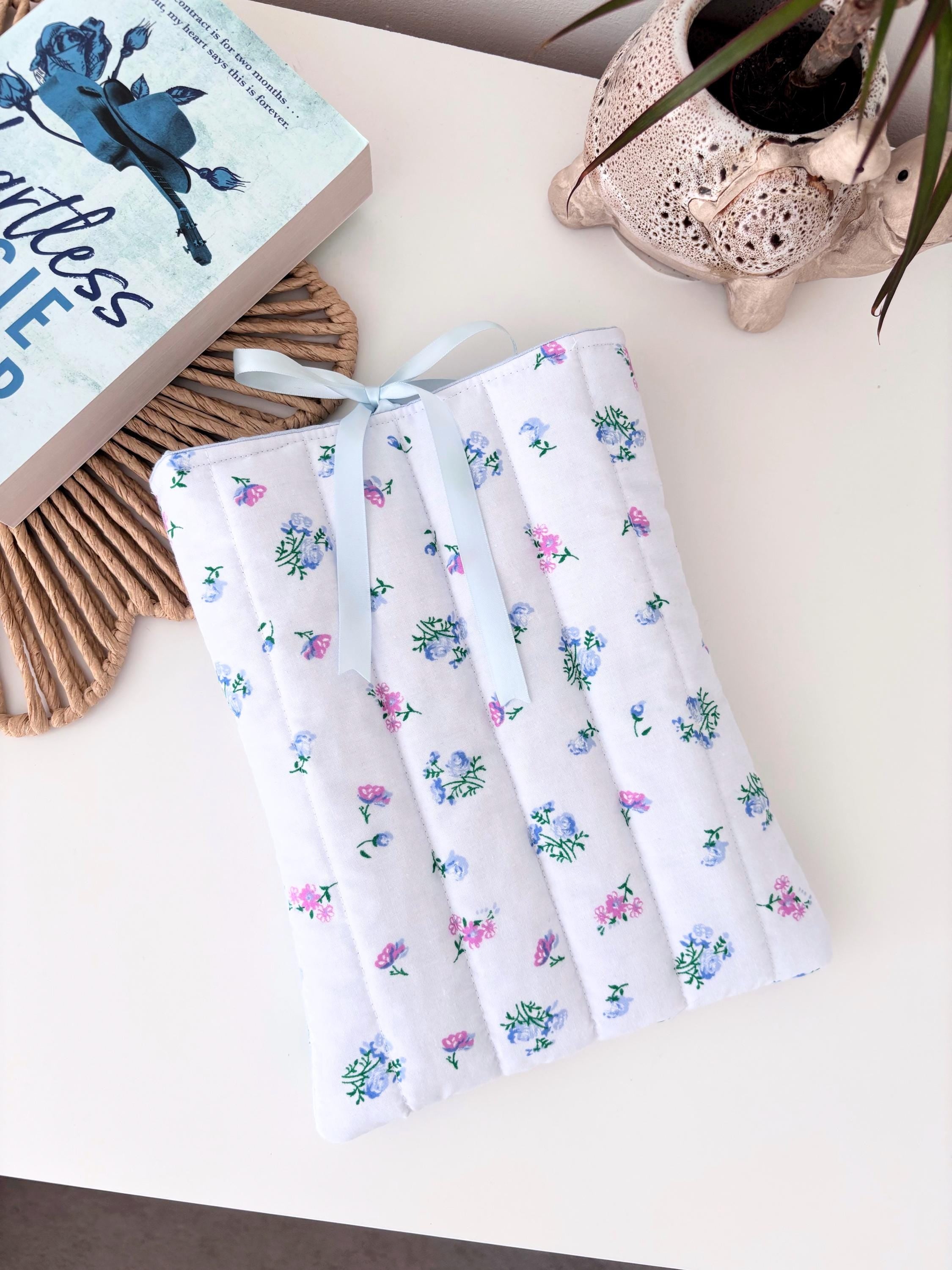 Blue floral quilted book sleeve