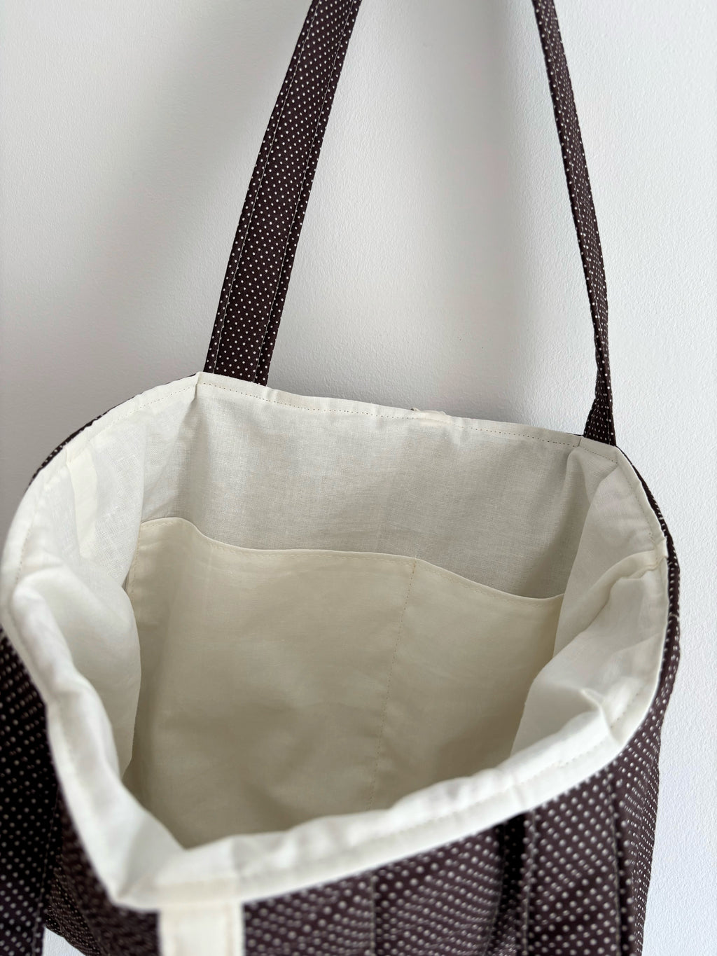 Brown mini polka dot quilted tote bag