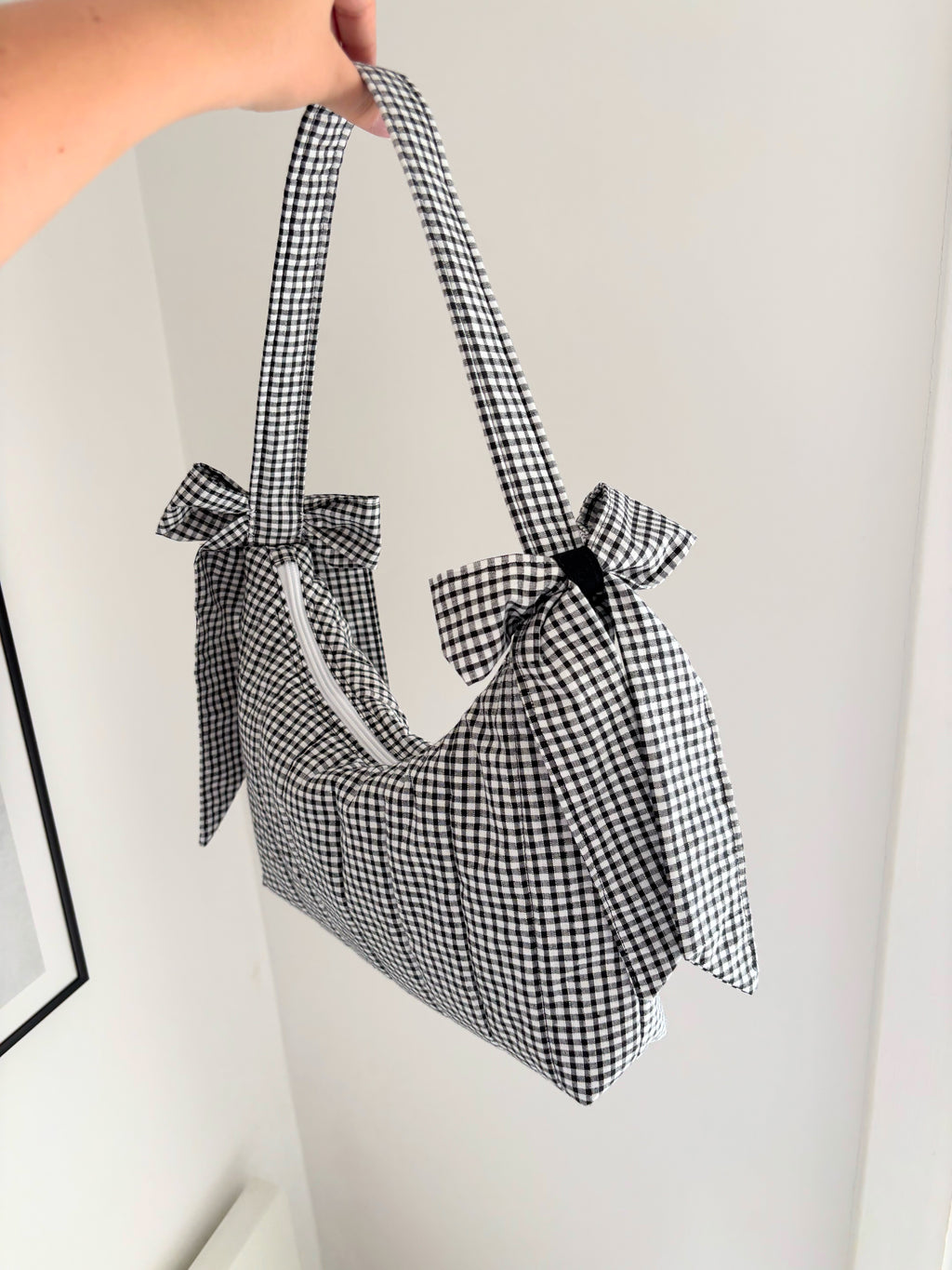 Black and white gingham quilted bow shoulder bag