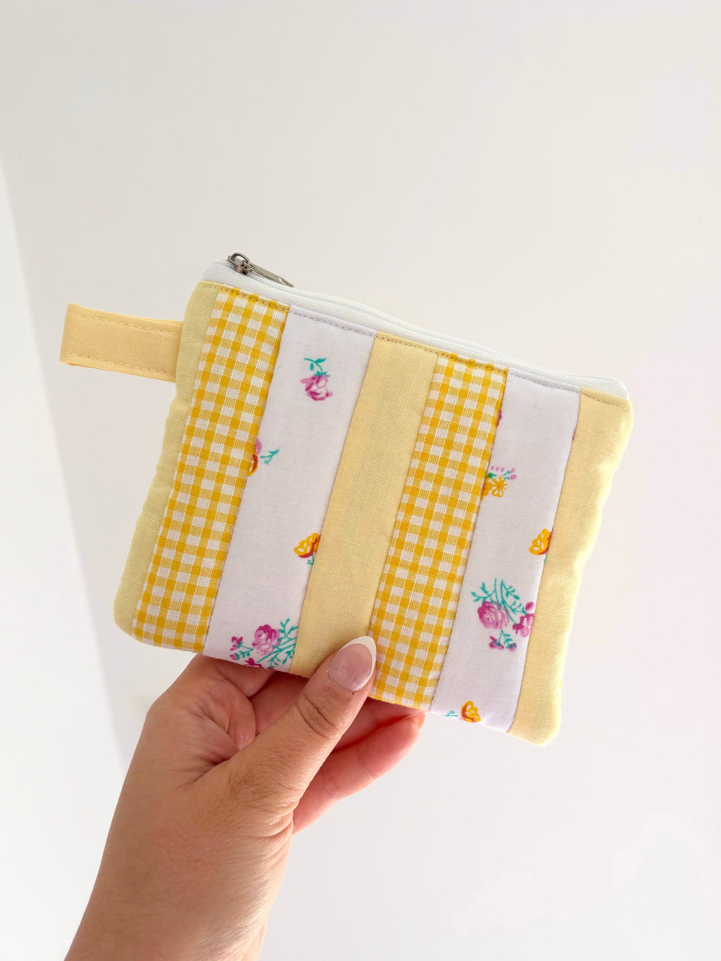 Small quilted yellow patchwork pouch