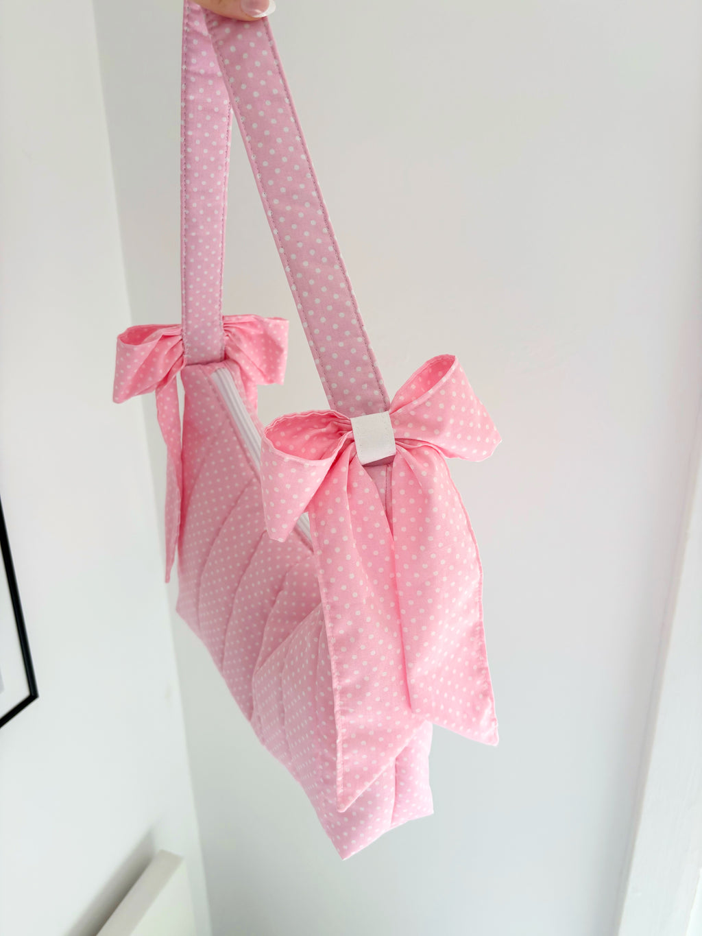 Pink polka dot quilted bow shoulder bag
