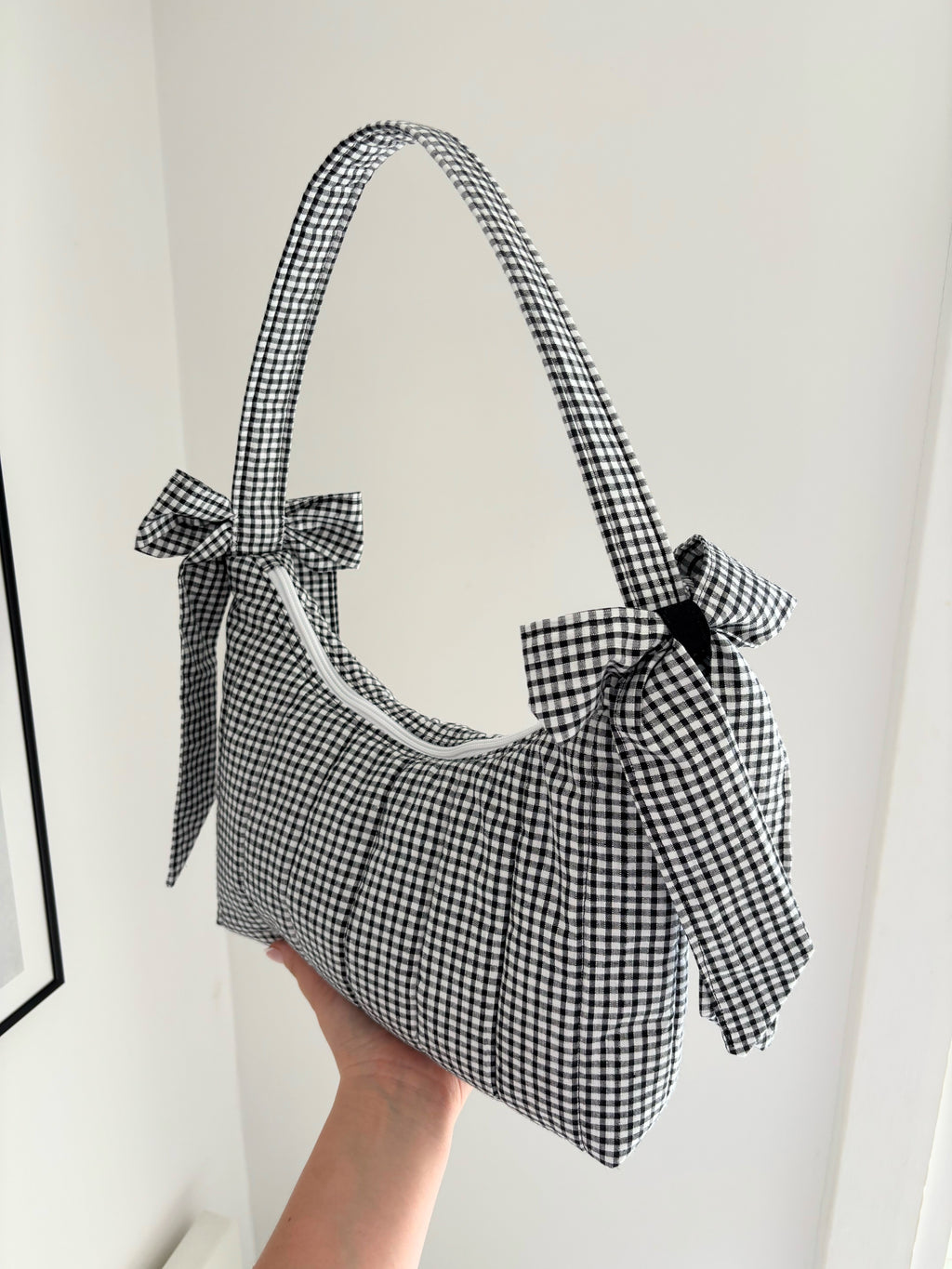 Black and white gingham quilted bow shoulder bag