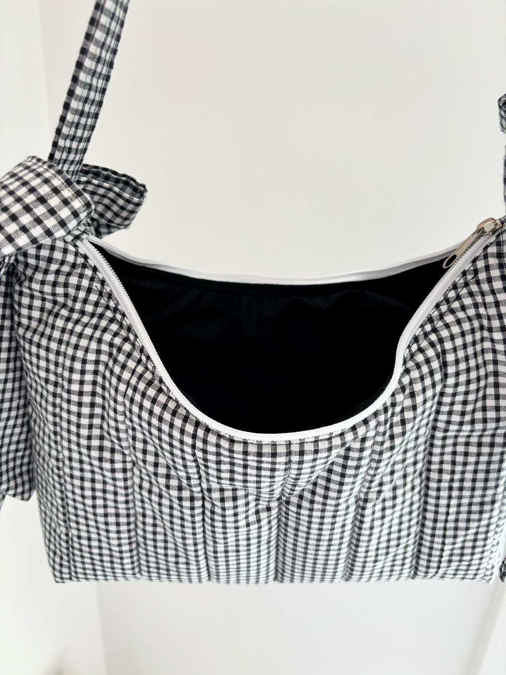 Black and white gingham quilted bow shoulder bag