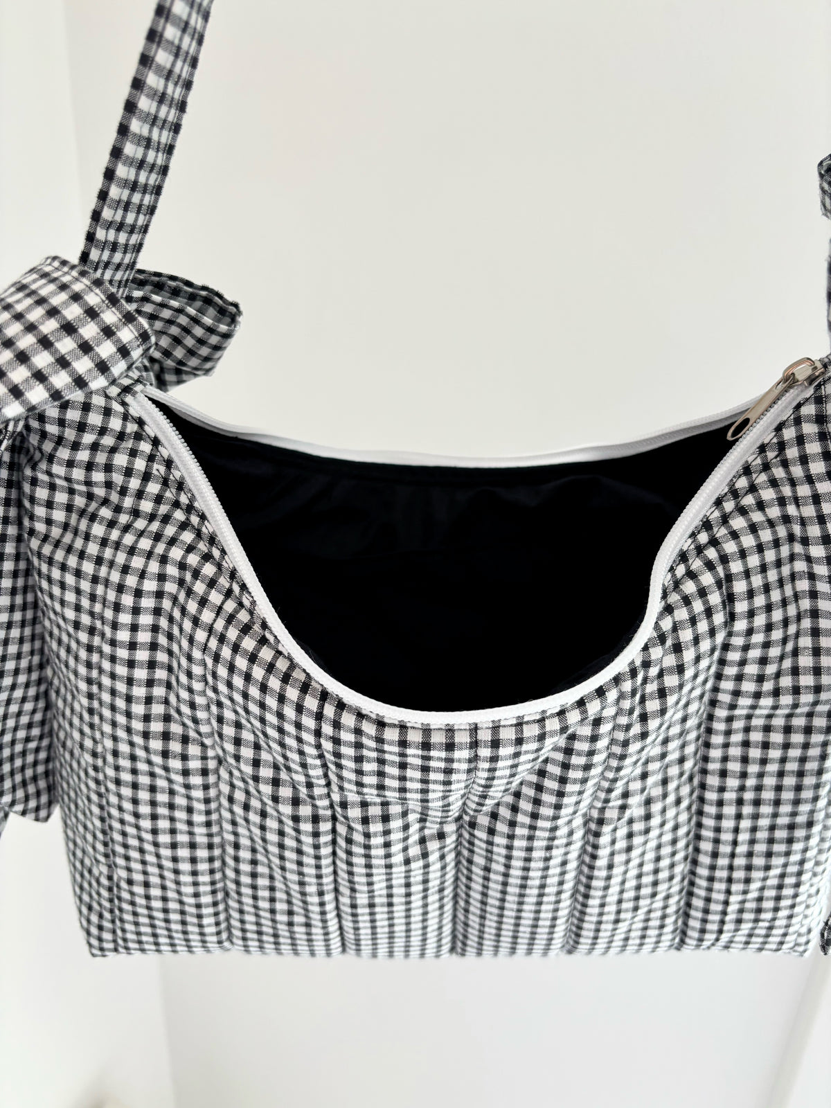Black and white gingham quilted bow shoulder bag
