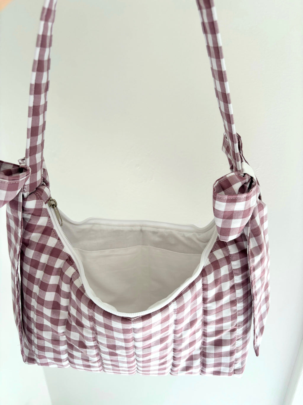 Mauve gingham quilted bow shoulder bag