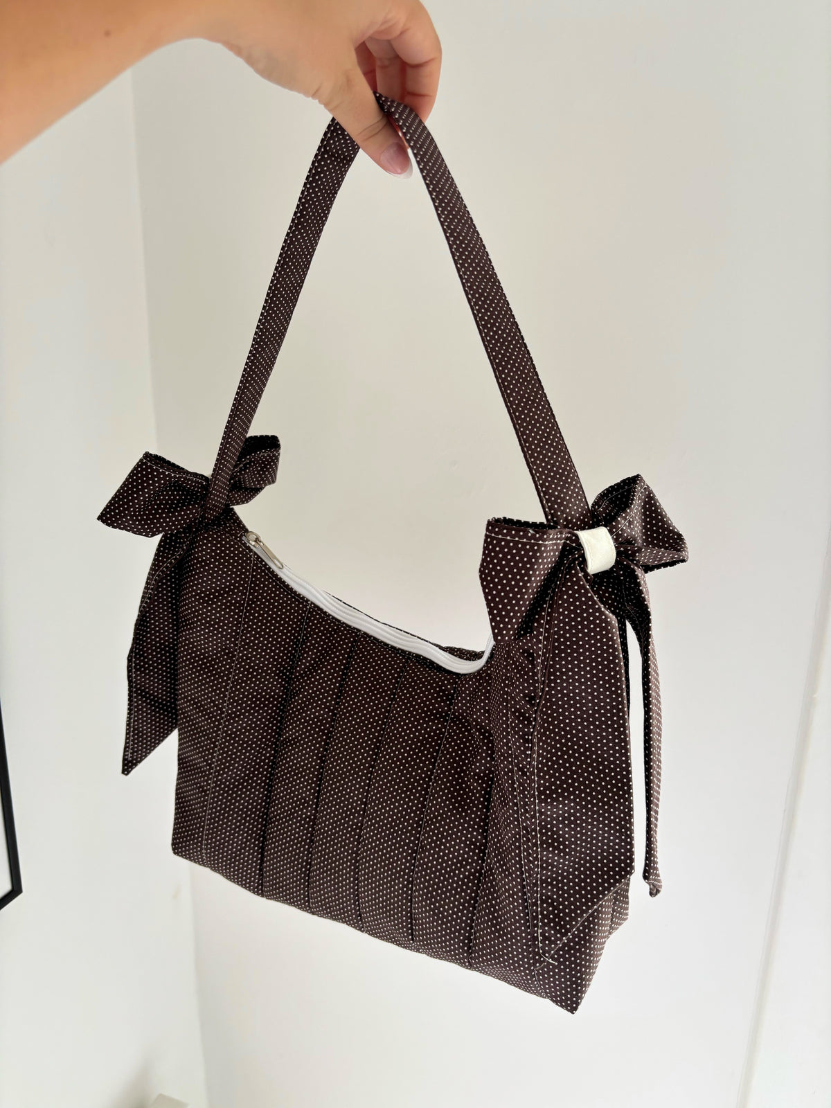 Brown mini polka dot bow shoulder bag