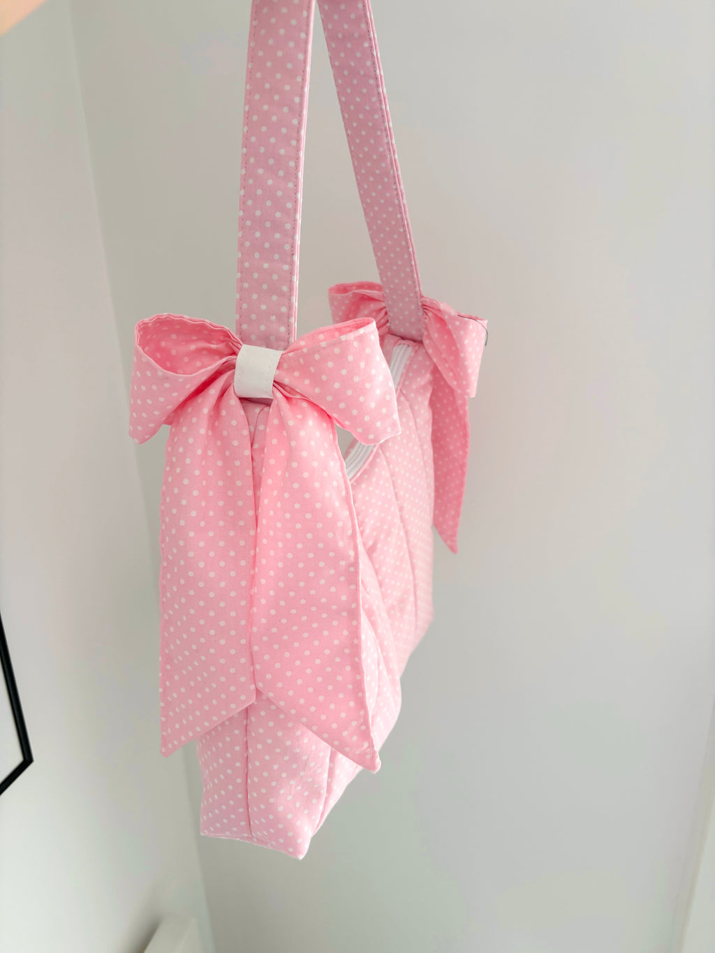 Pink polka dot quilted bow shoulder bag